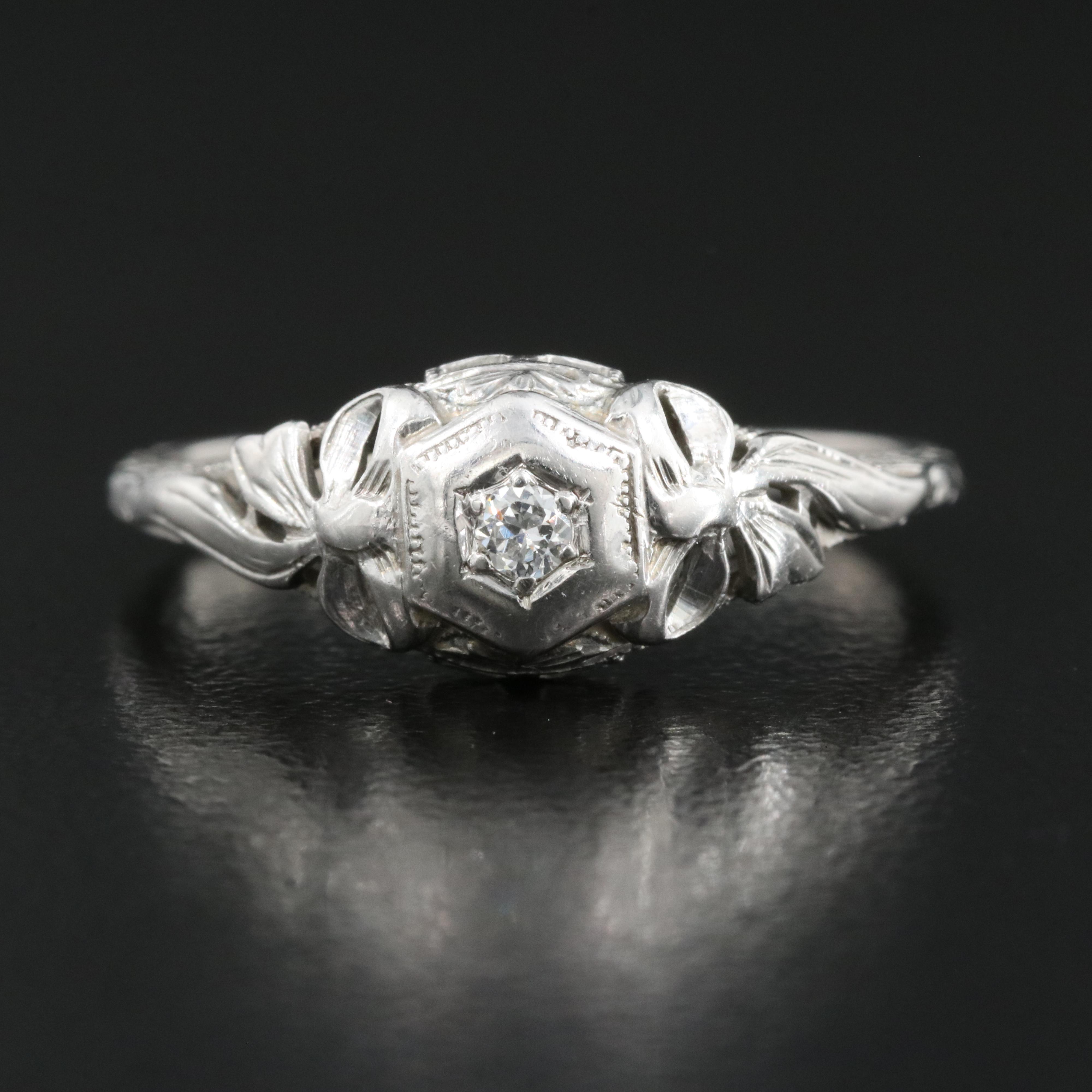 18K 0.04 CT Diamond Ring