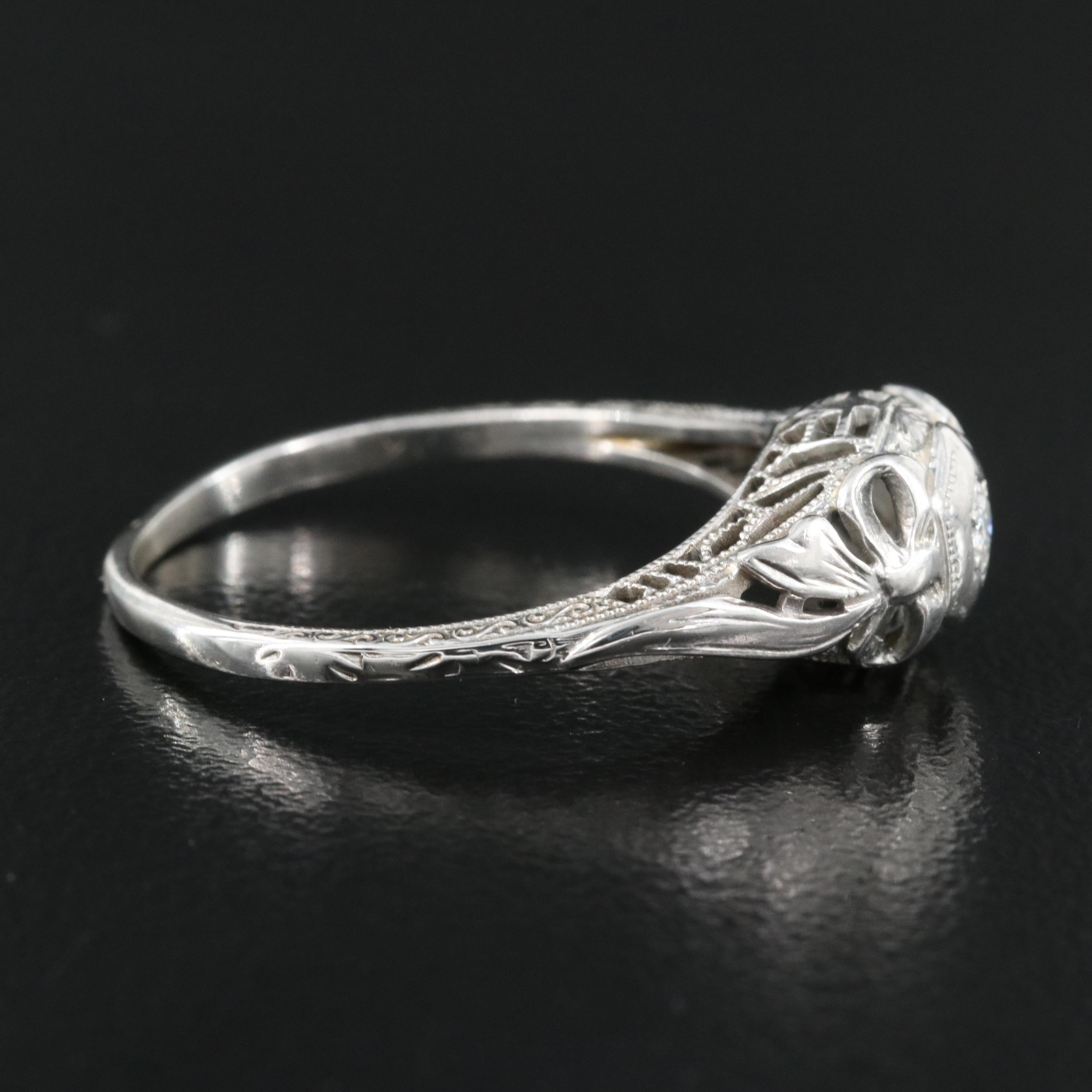 18K 0.04 CT Diamond Ring