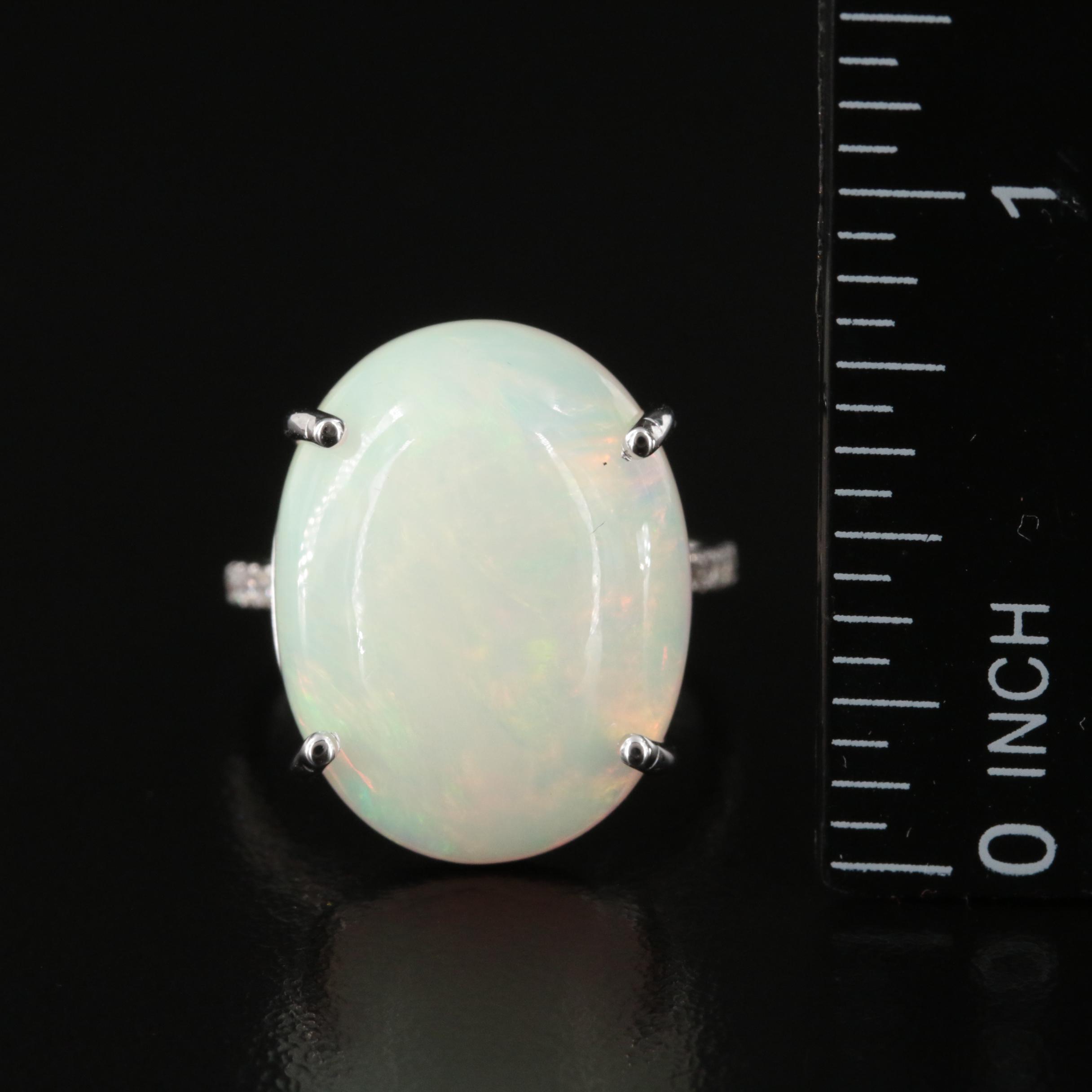 14K 12.31 CT Opal and Diamond Ring