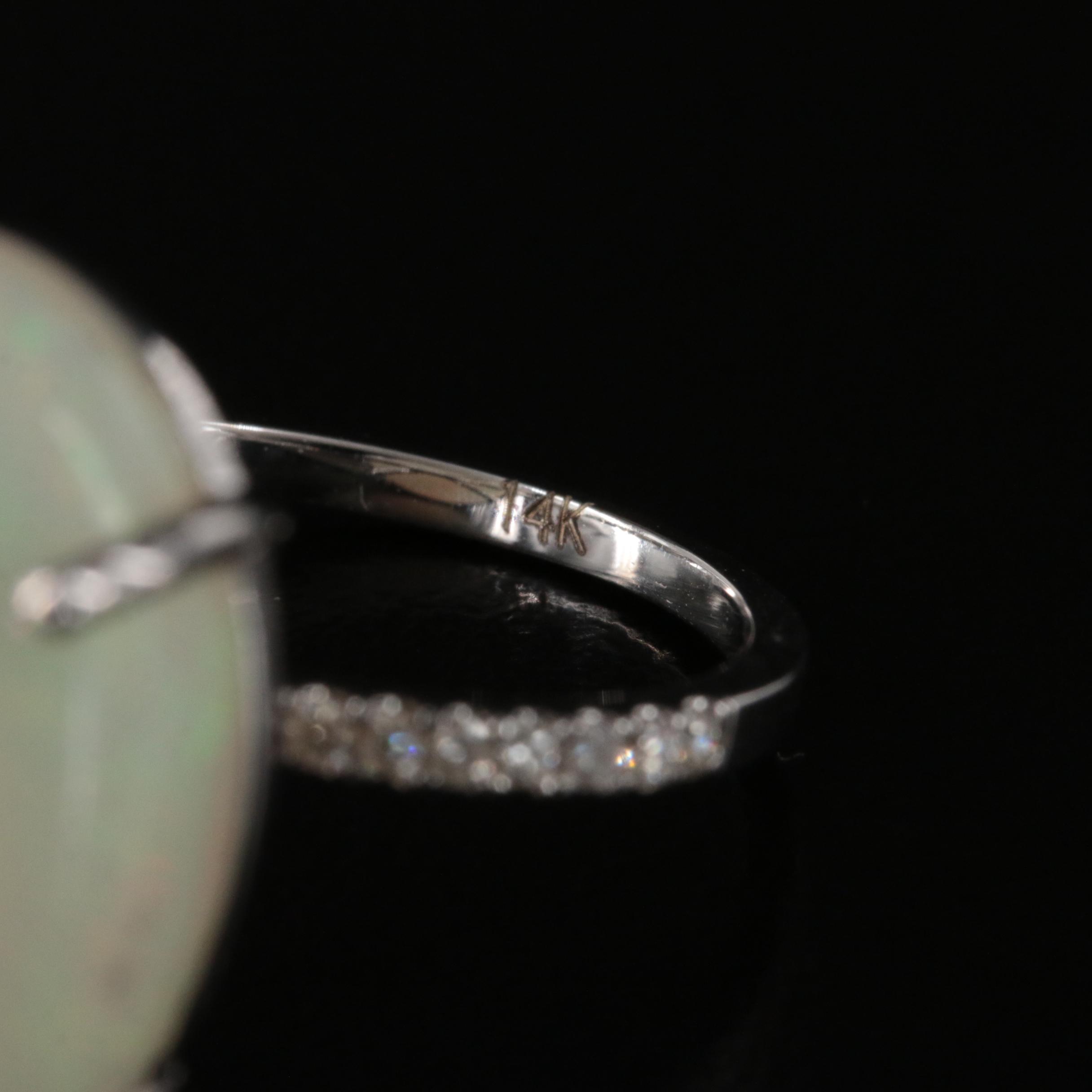 14K 12.31 CT Opal and Diamond Ring