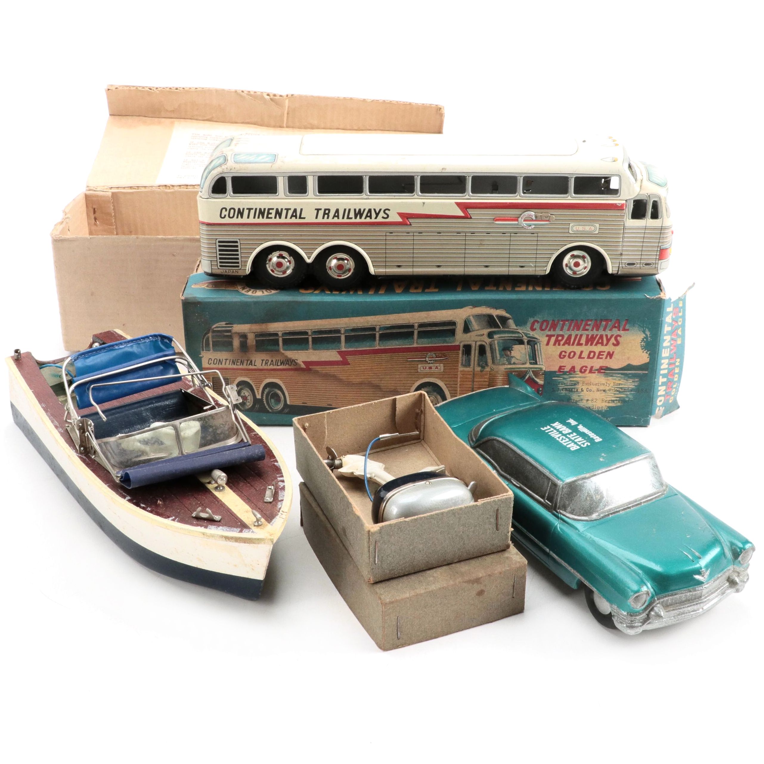 S. J. Charia Co. Continental Trailways Golden Eagle with Car Bank and Model Boat