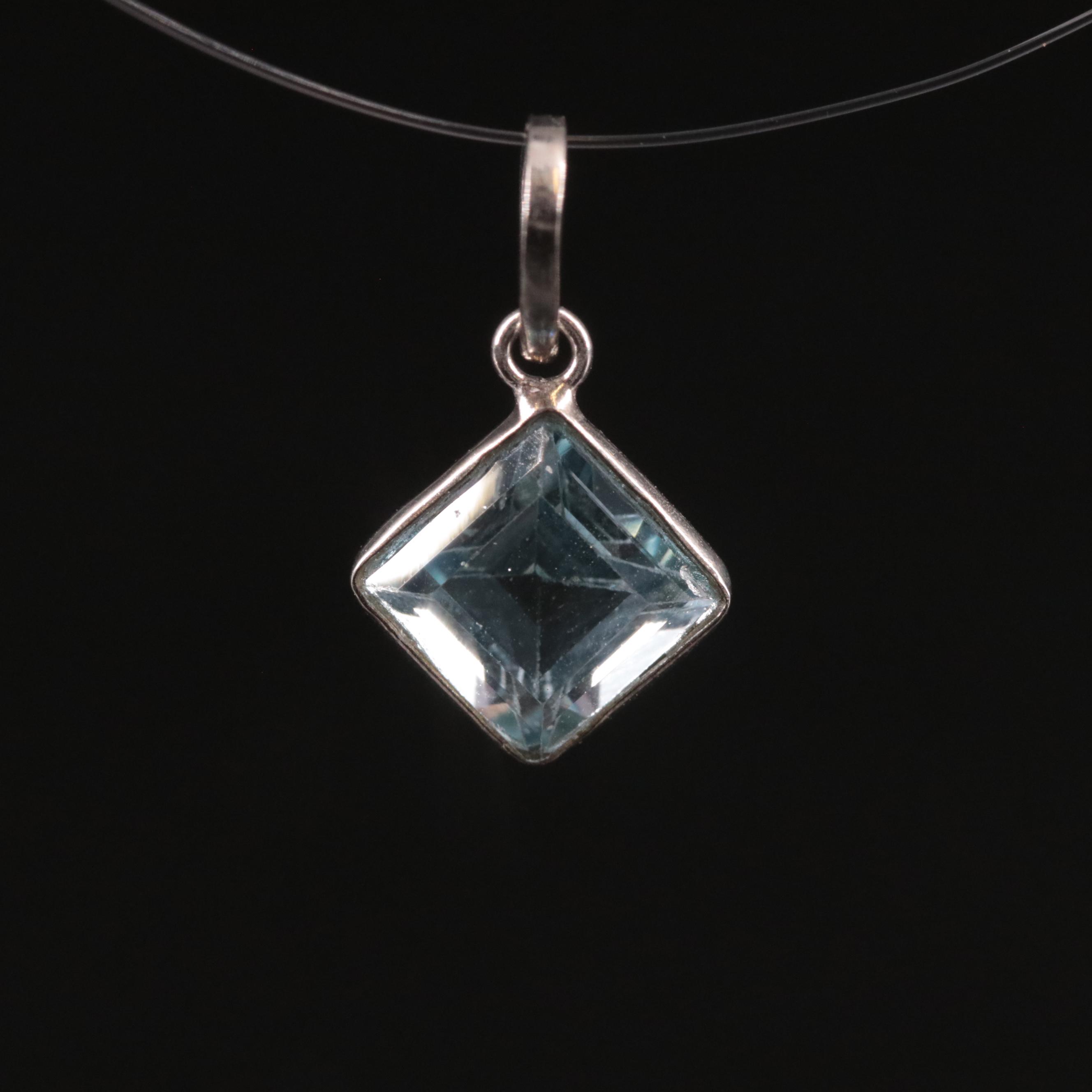 14K Blue Topaz Pendant