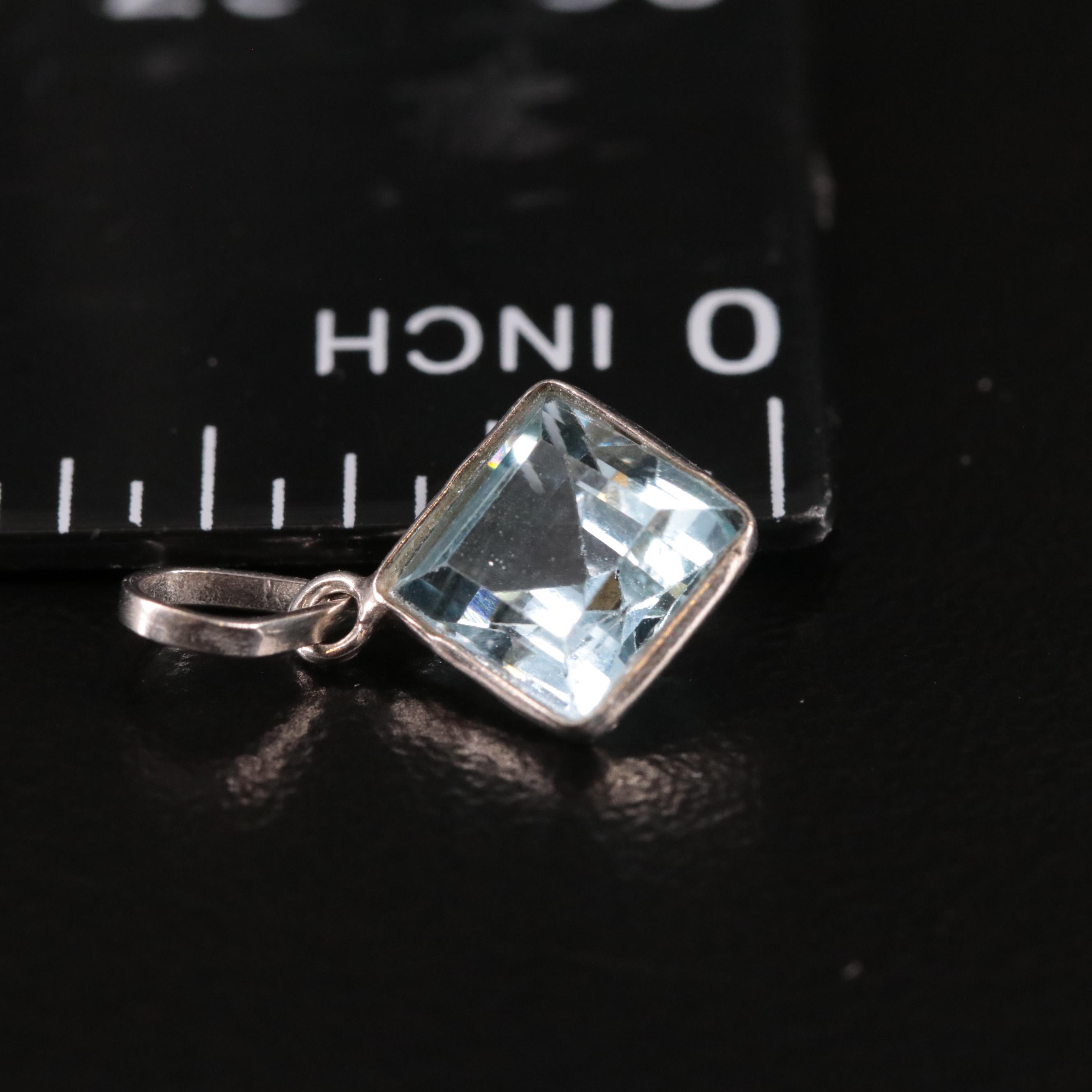 14K Blue Topaz Pendant