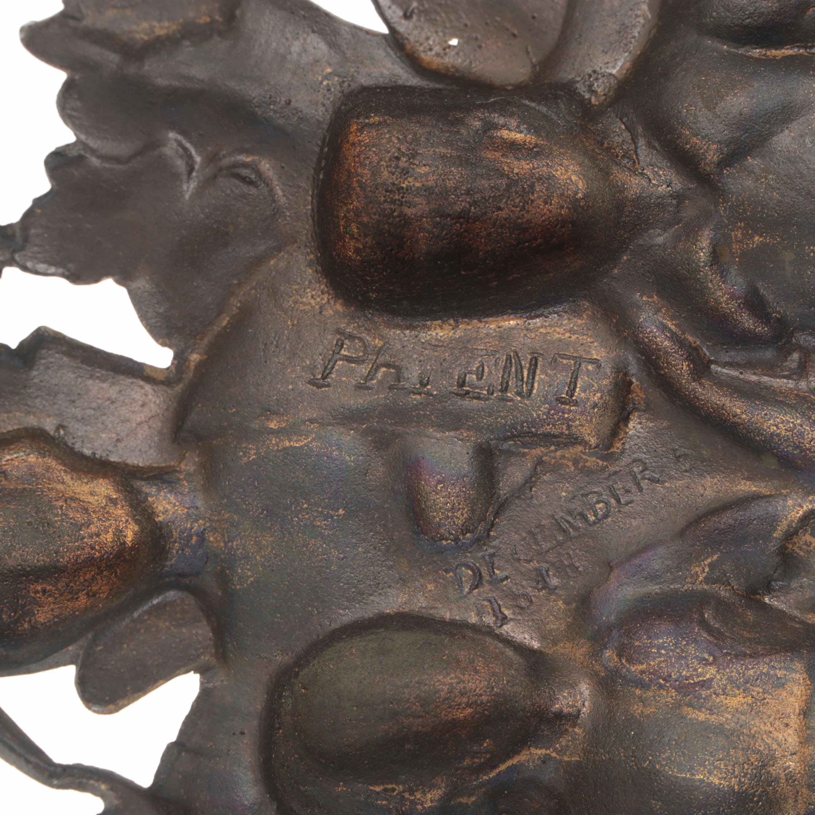 Cornelius & Co. Cast Brass Figural Candlesticks