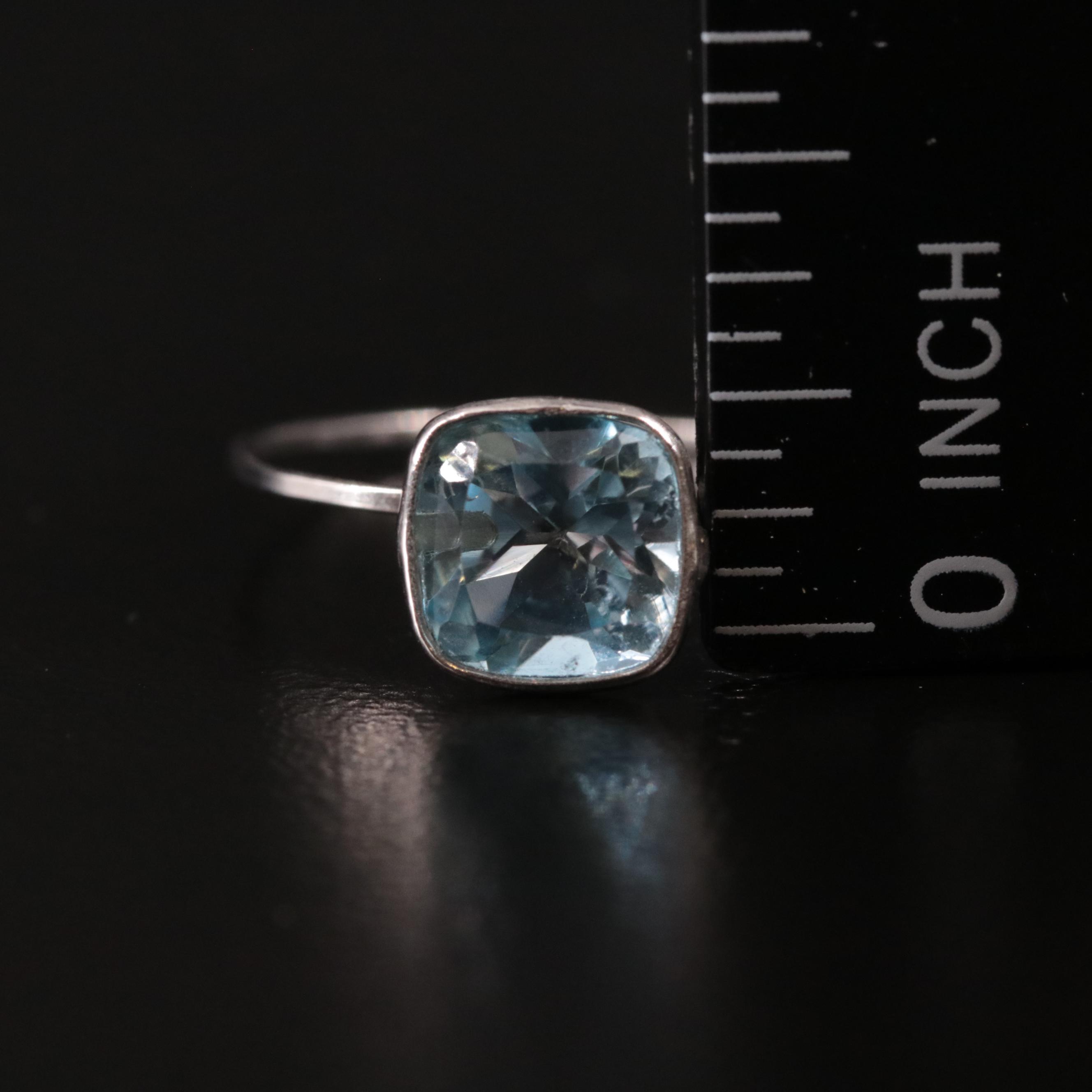 14K Blue Topaz Solitaire Ring