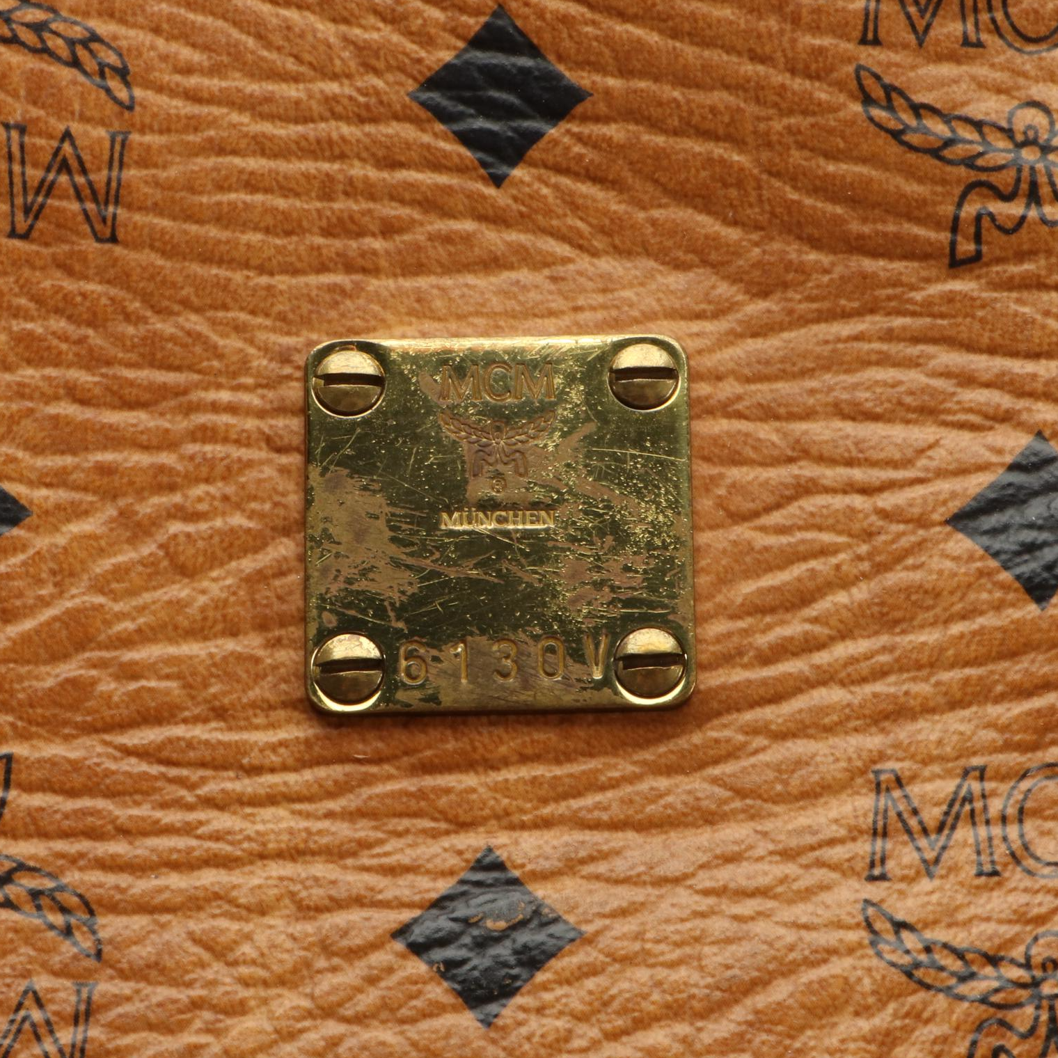 MCM Golf Collection Boston Bag in Visetos Coated Canvas and Cognac Leather