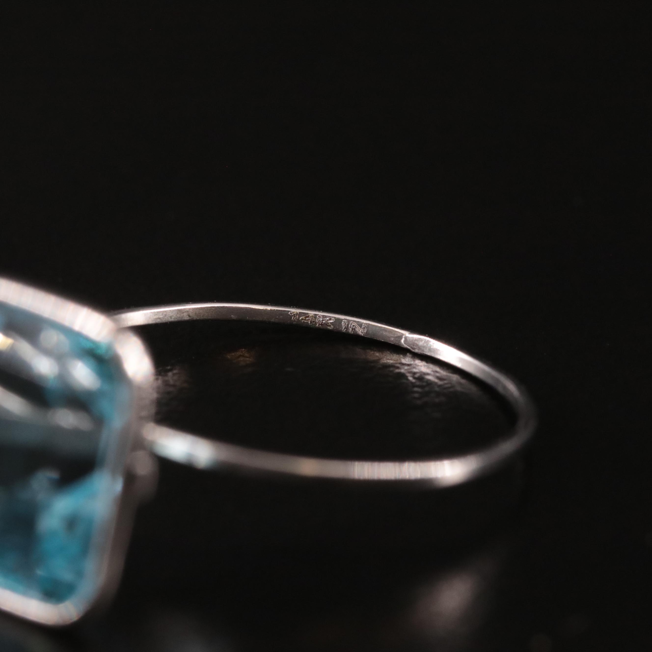 14K Blue Topaz Solitaire Ring