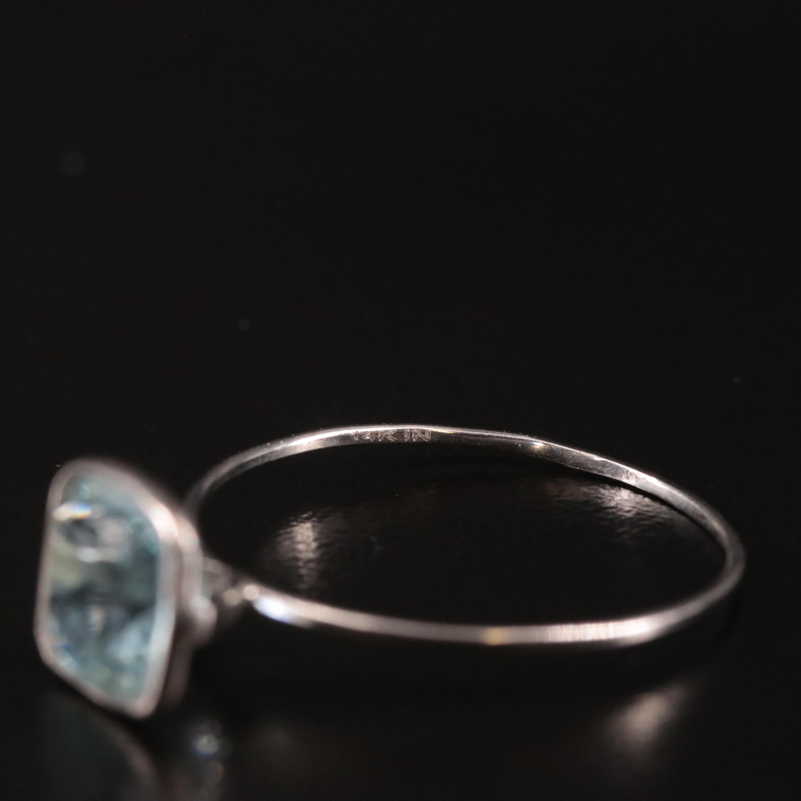 14K Blue Topaz Ring