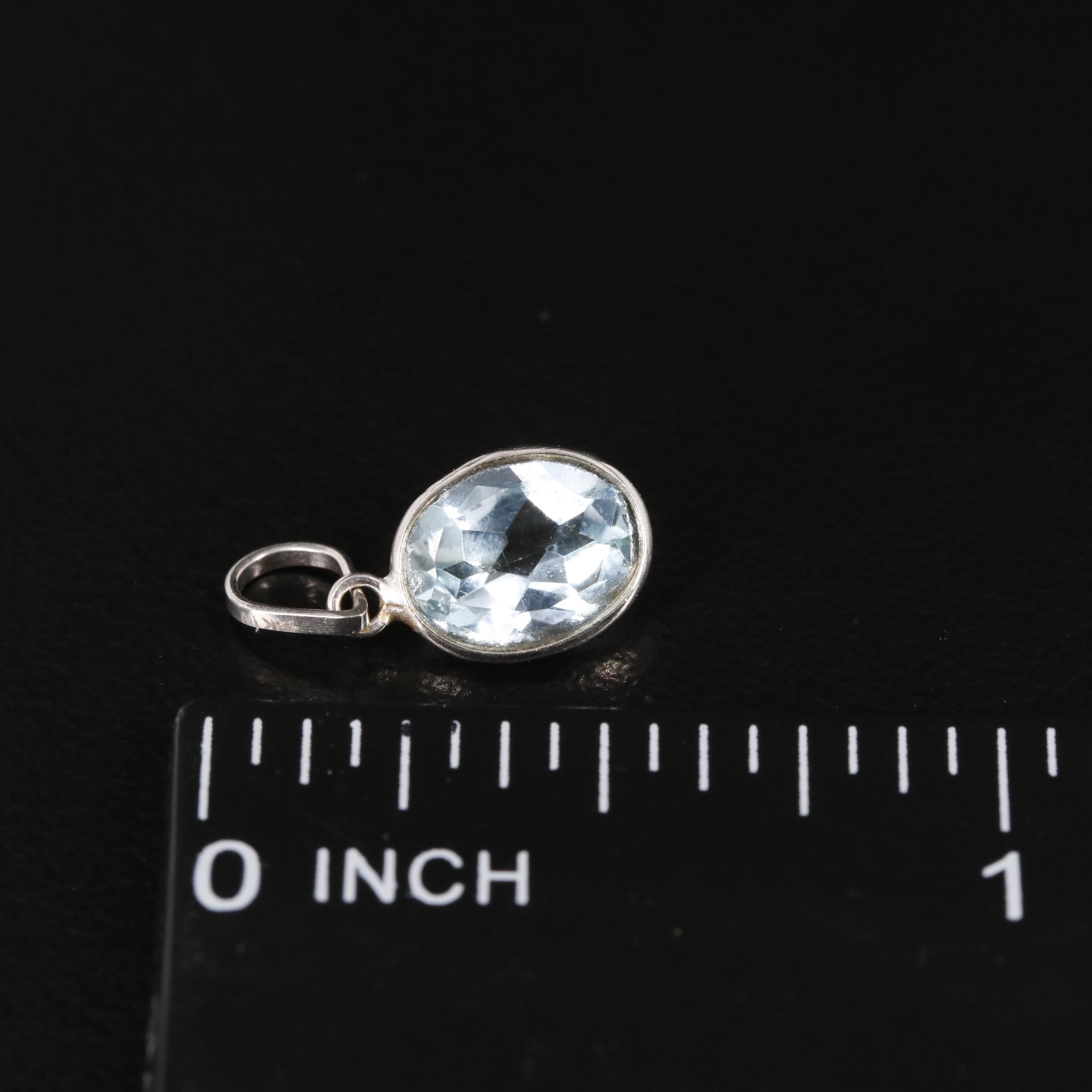 14K Blue Topaz Pendant