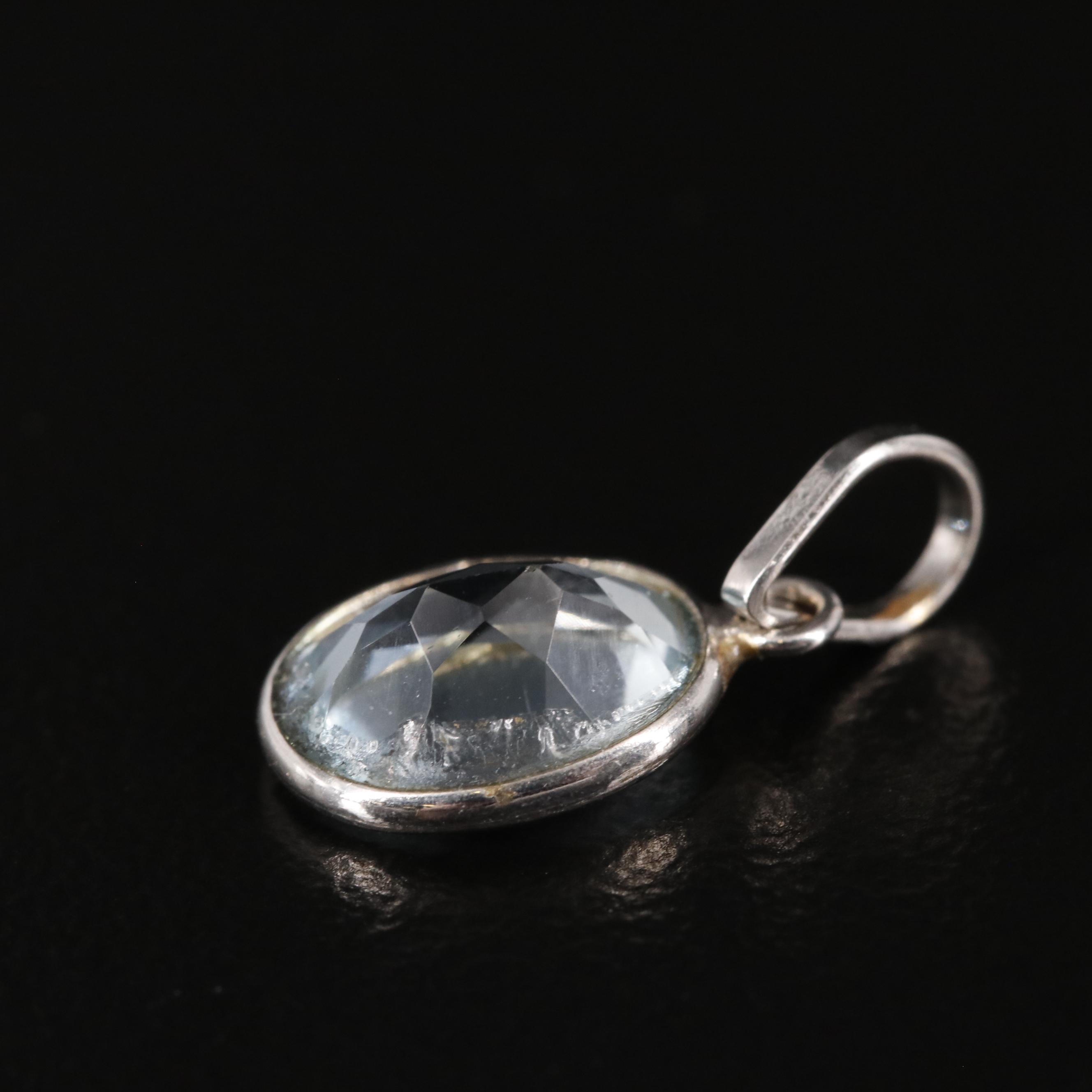 14K Blue Topaz Pendant