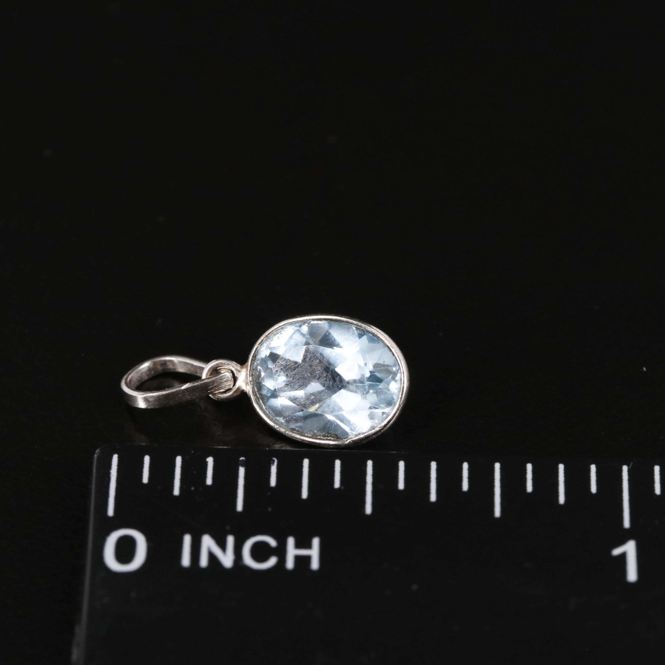 14K Blue Topaz Pendant