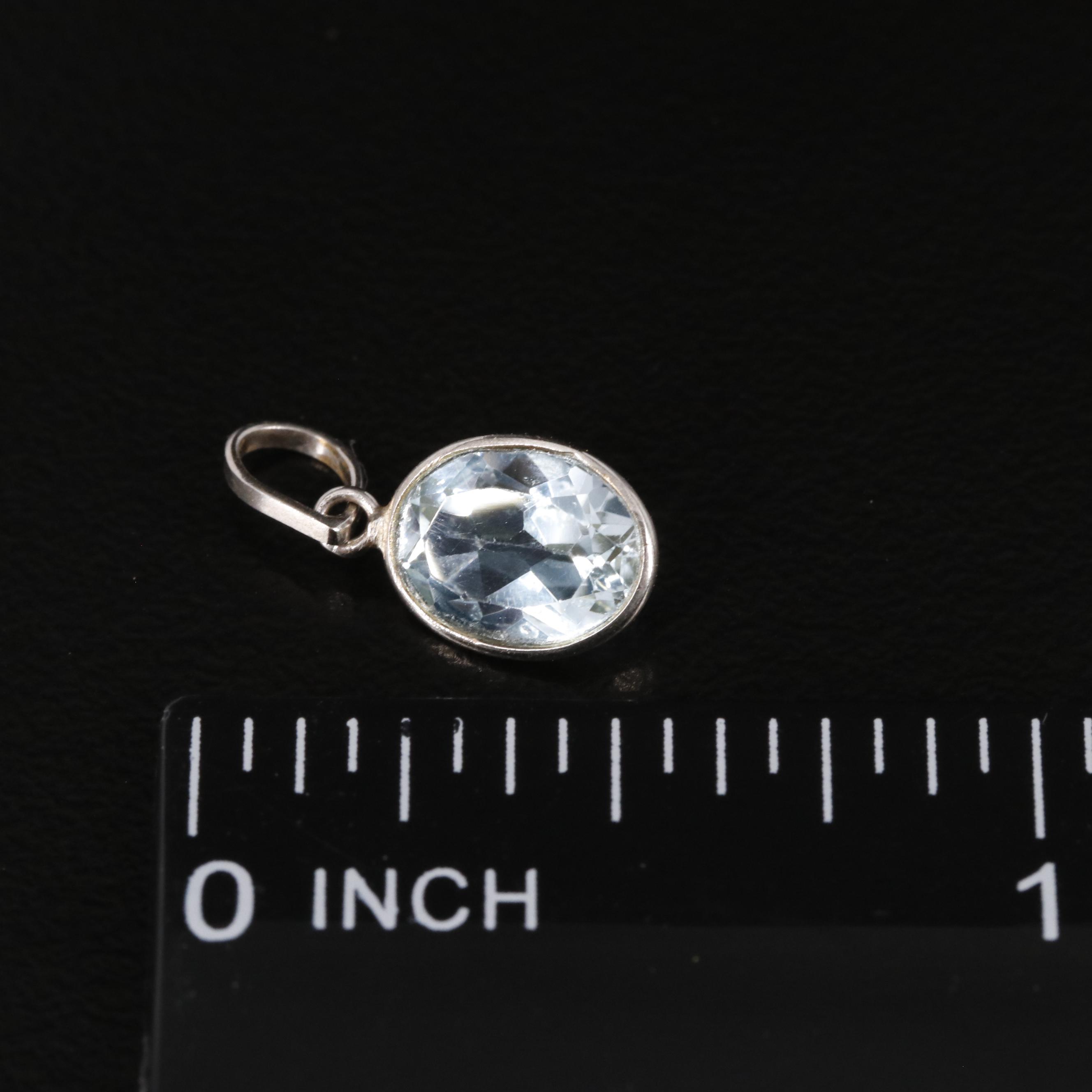 14K Blue Topaz Pendant