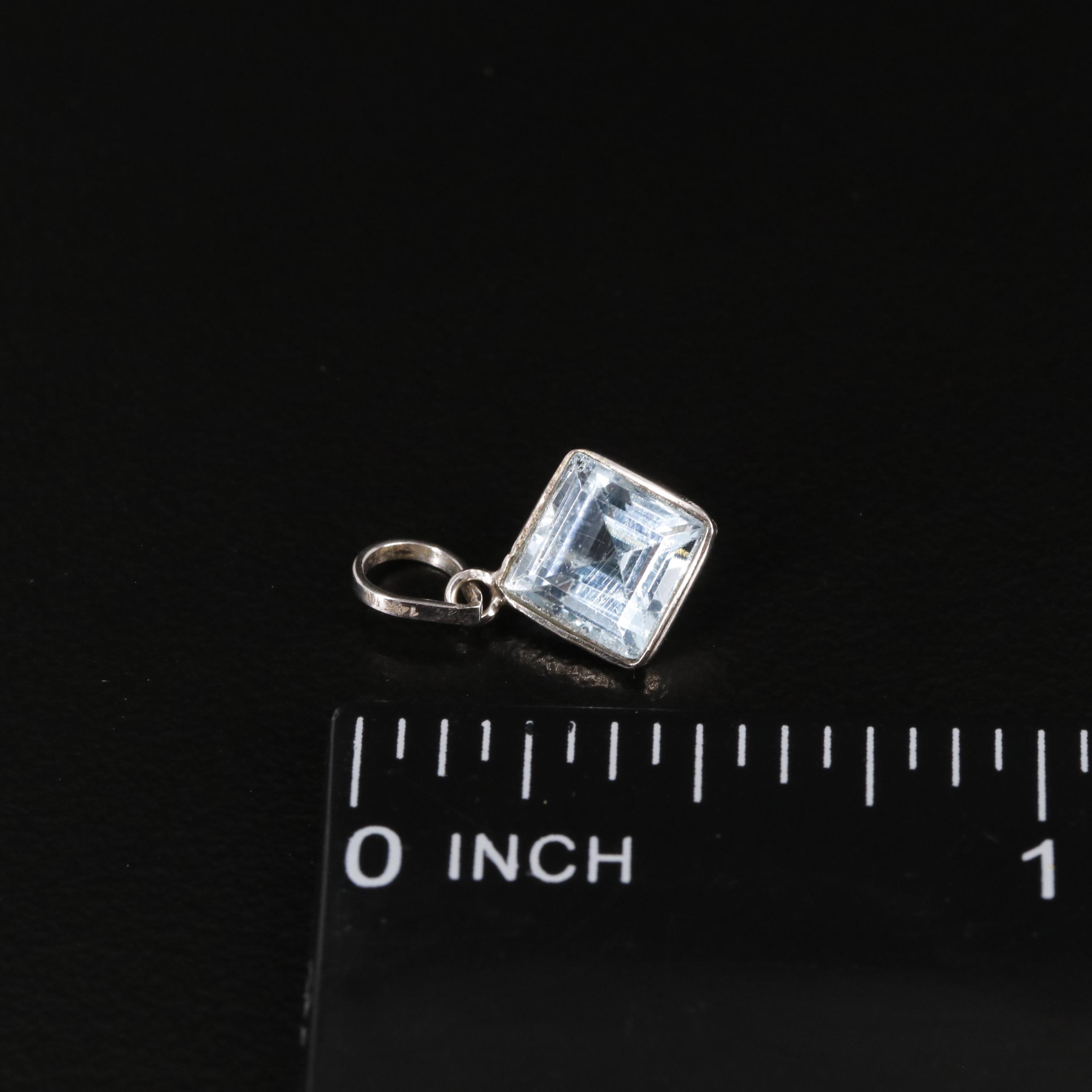 14K Blue Topaz Pendant