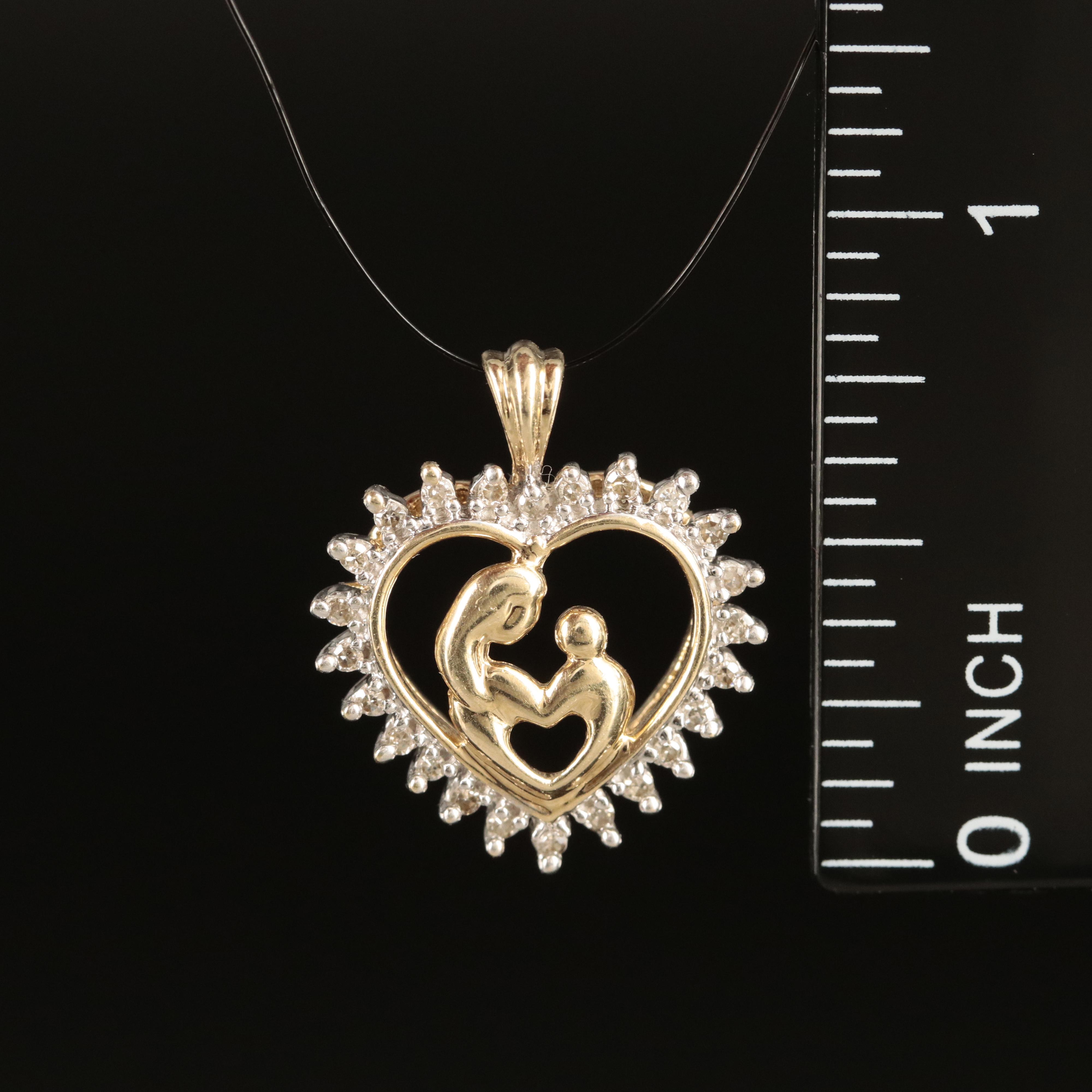 10K 0.17 CTW Diamond Mother and Child Heart Pendant