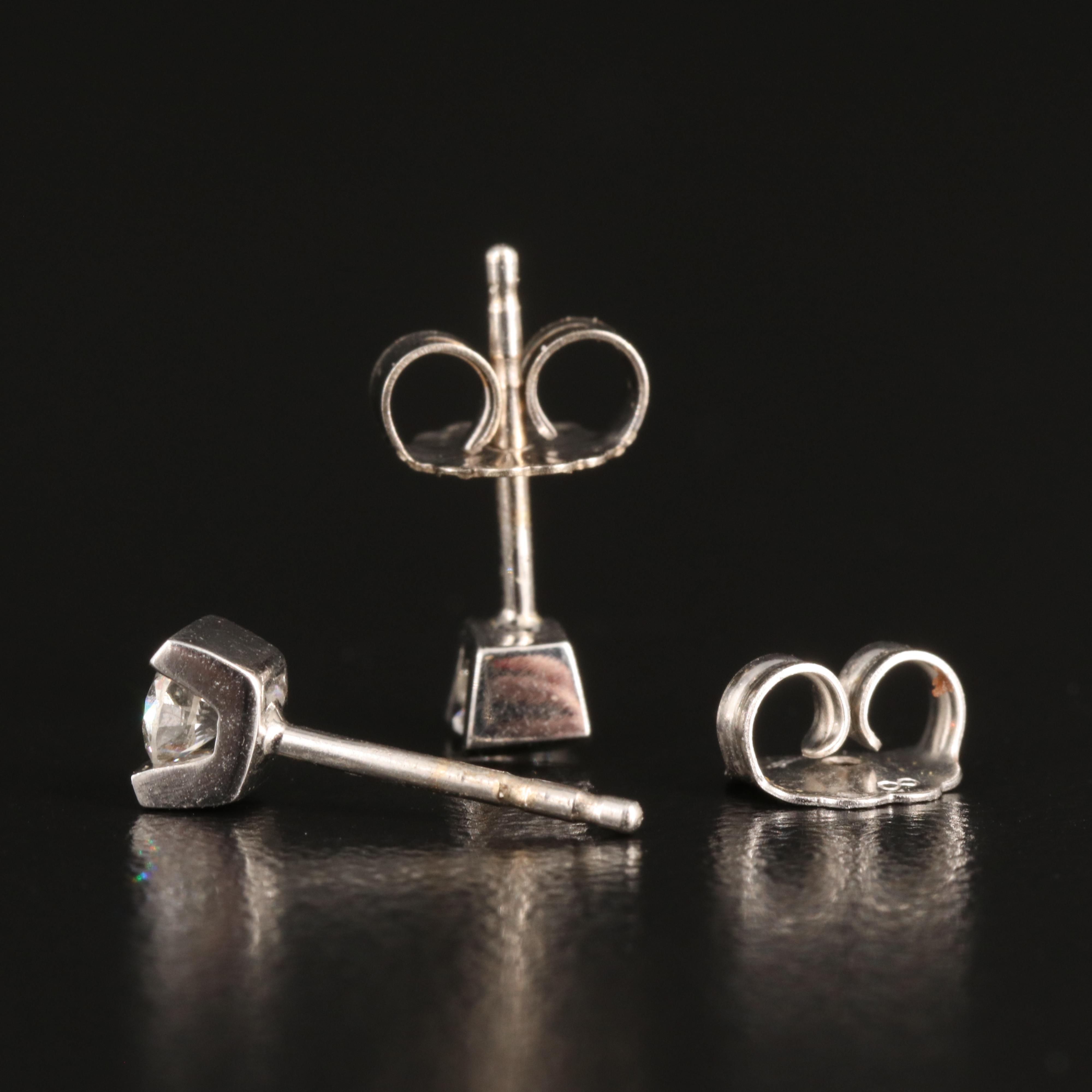 14K 0.24 CTW Diamond Tension Set Stud Earrings