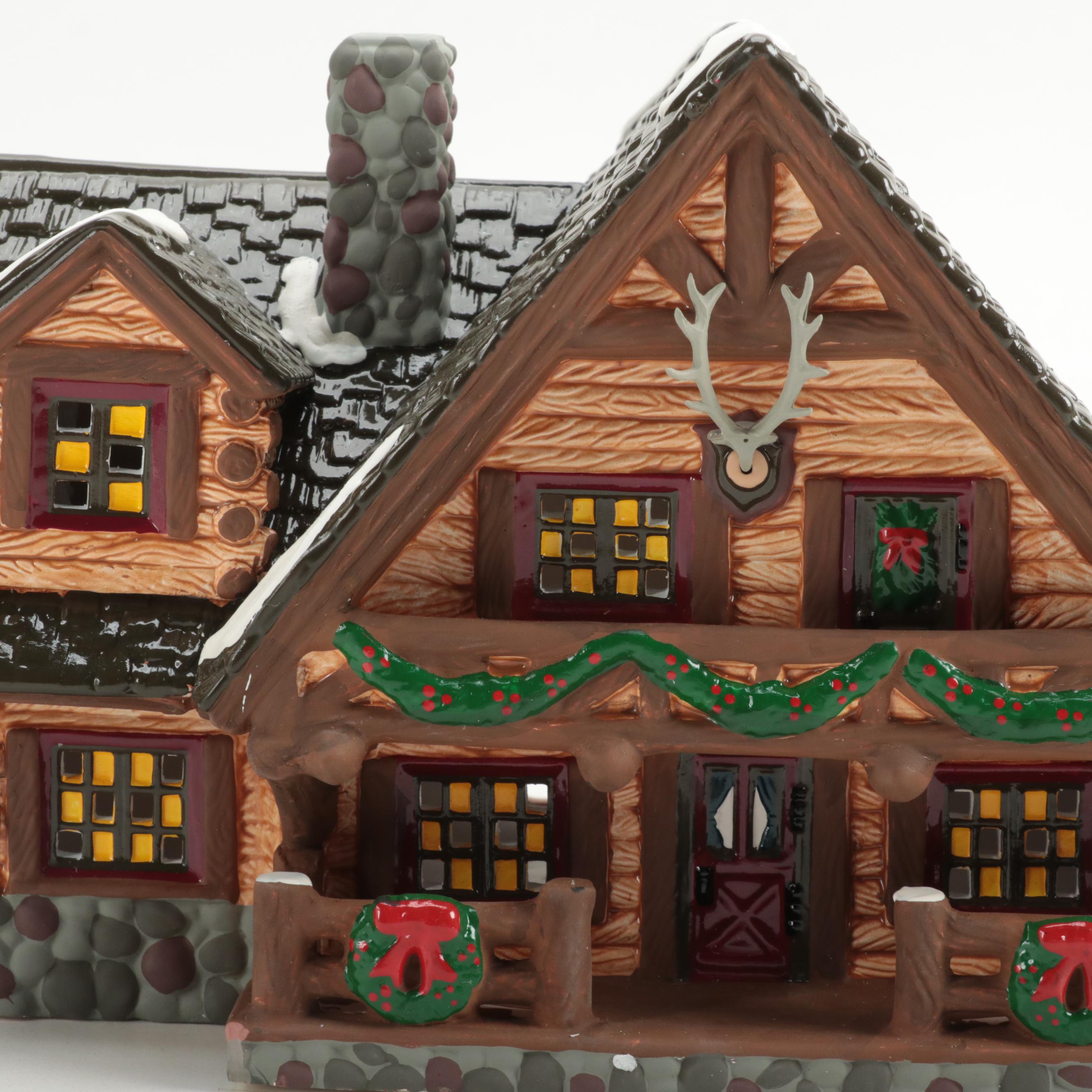 Department 56 "Hunting Lodge" with Other Snow Village Illuminated Houses