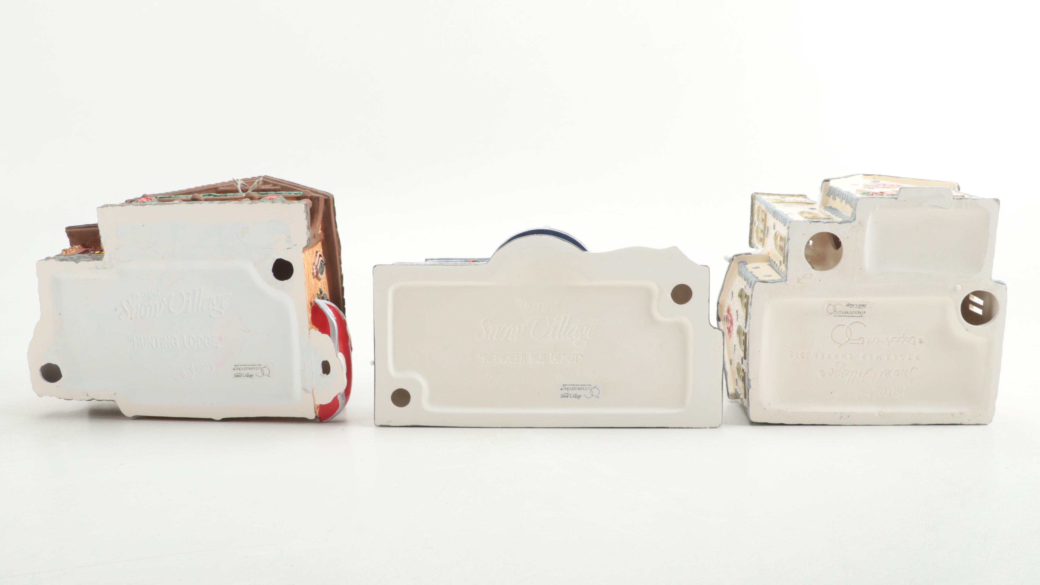 Department 56 "Hunting Lodge" with Other Snow Village Illuminated Houses