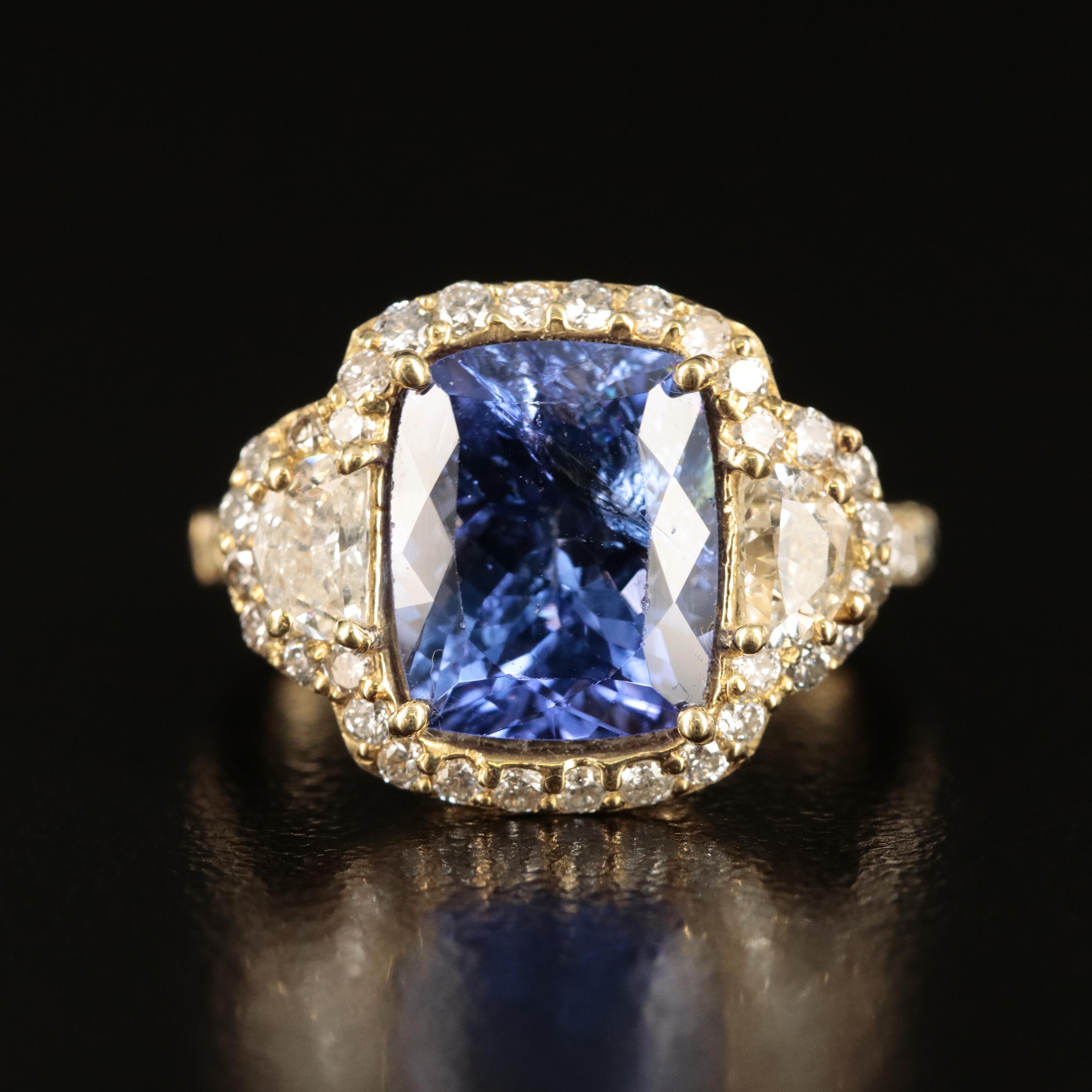 18K 4.20 CT Tanzanite and 1.26 CTW Diamond Ring