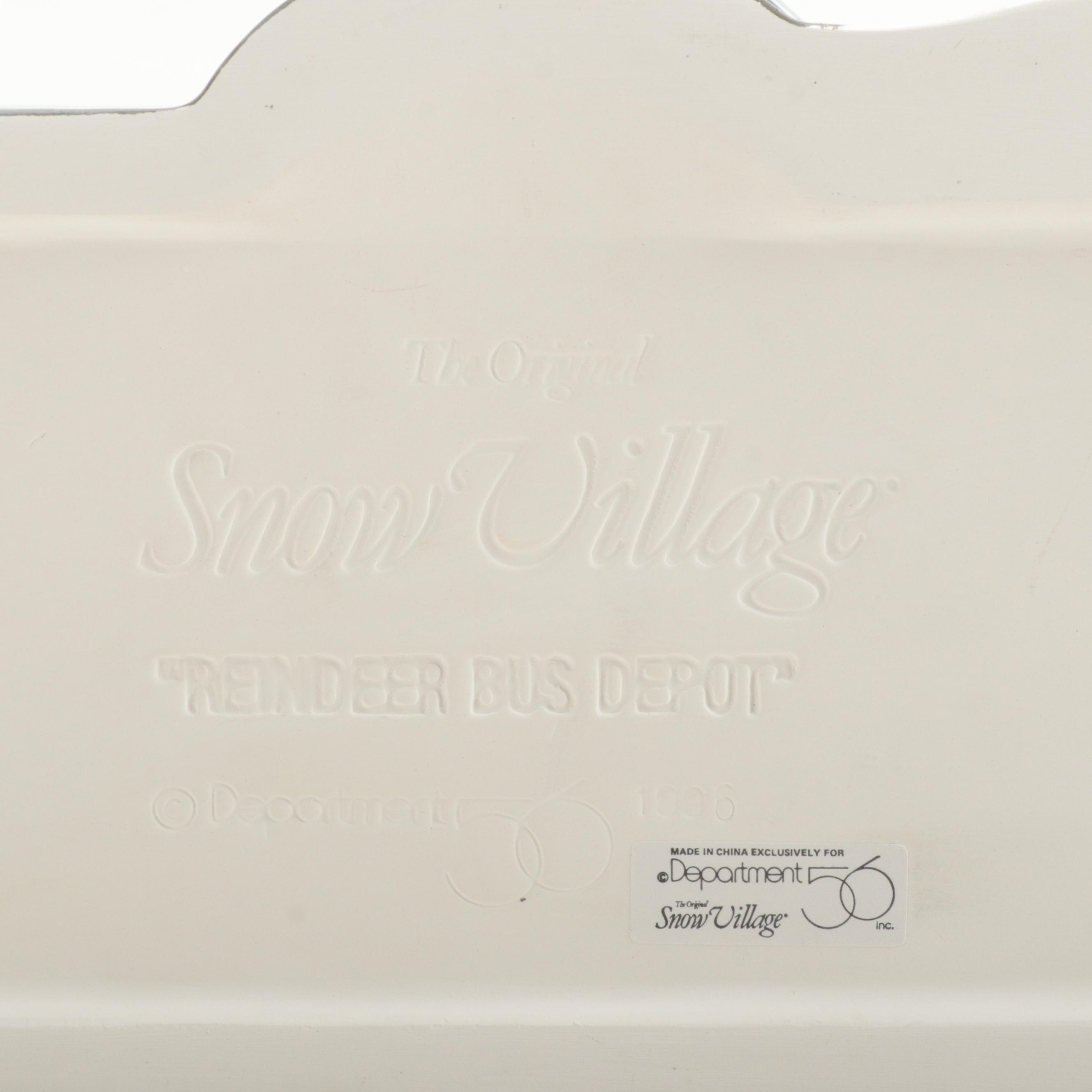 Department 56 "Hunting Lodge" with Other Snow Village Illuminated Houses