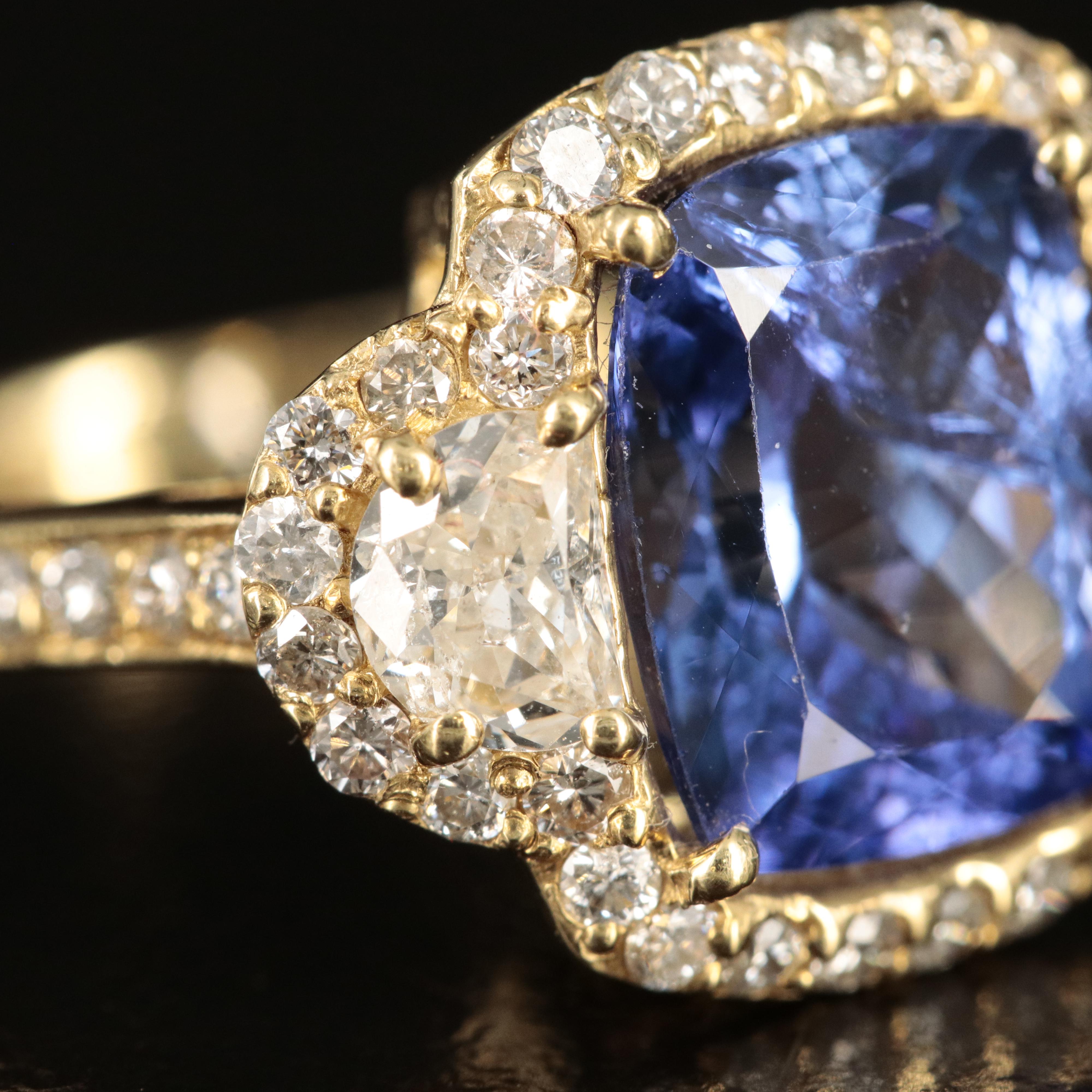 18K 4.20 CT Tanzanite and 1.26 CTW Diamond Ring