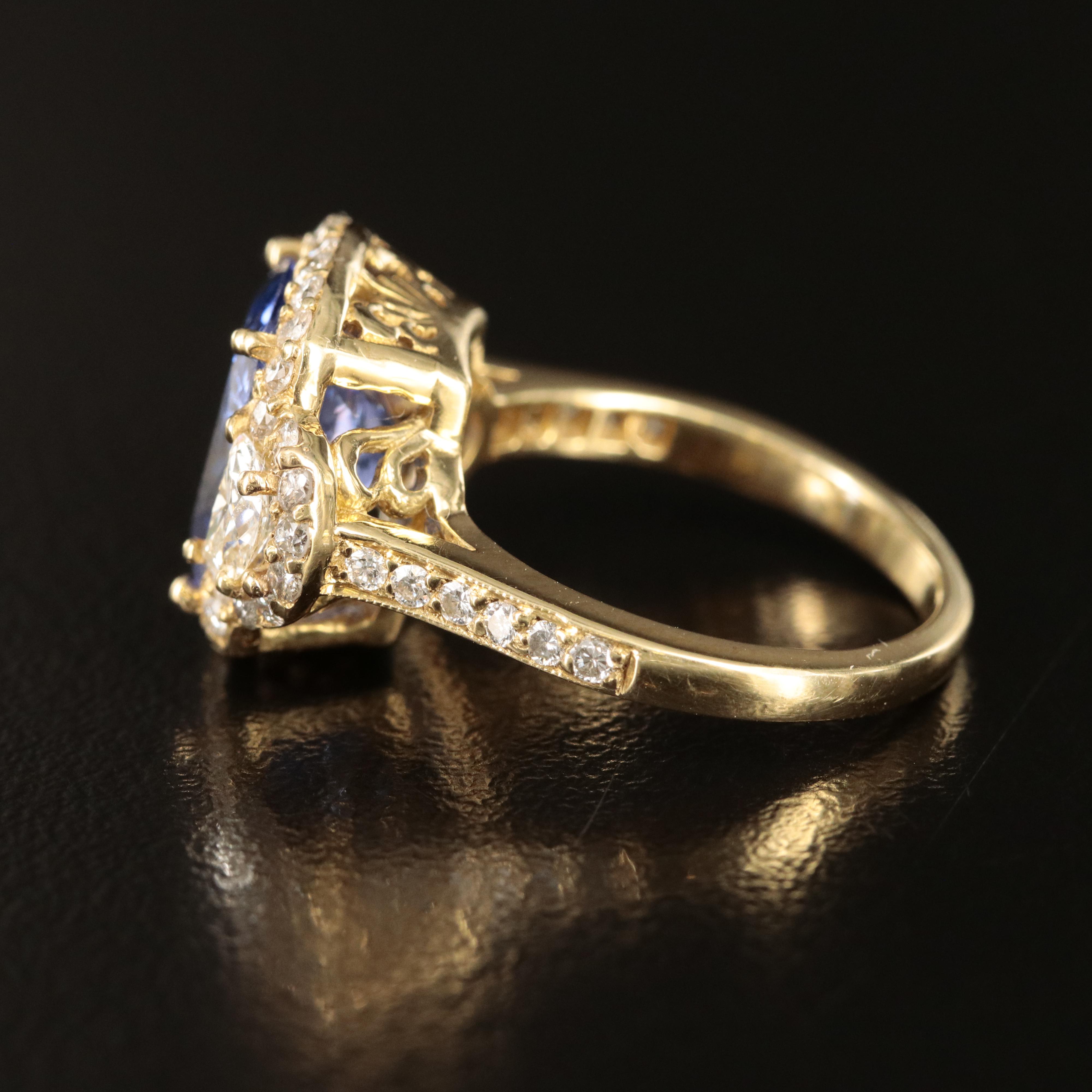 18K 4.20 CT Tanzanite and 1.26 CTW Diamond Ring