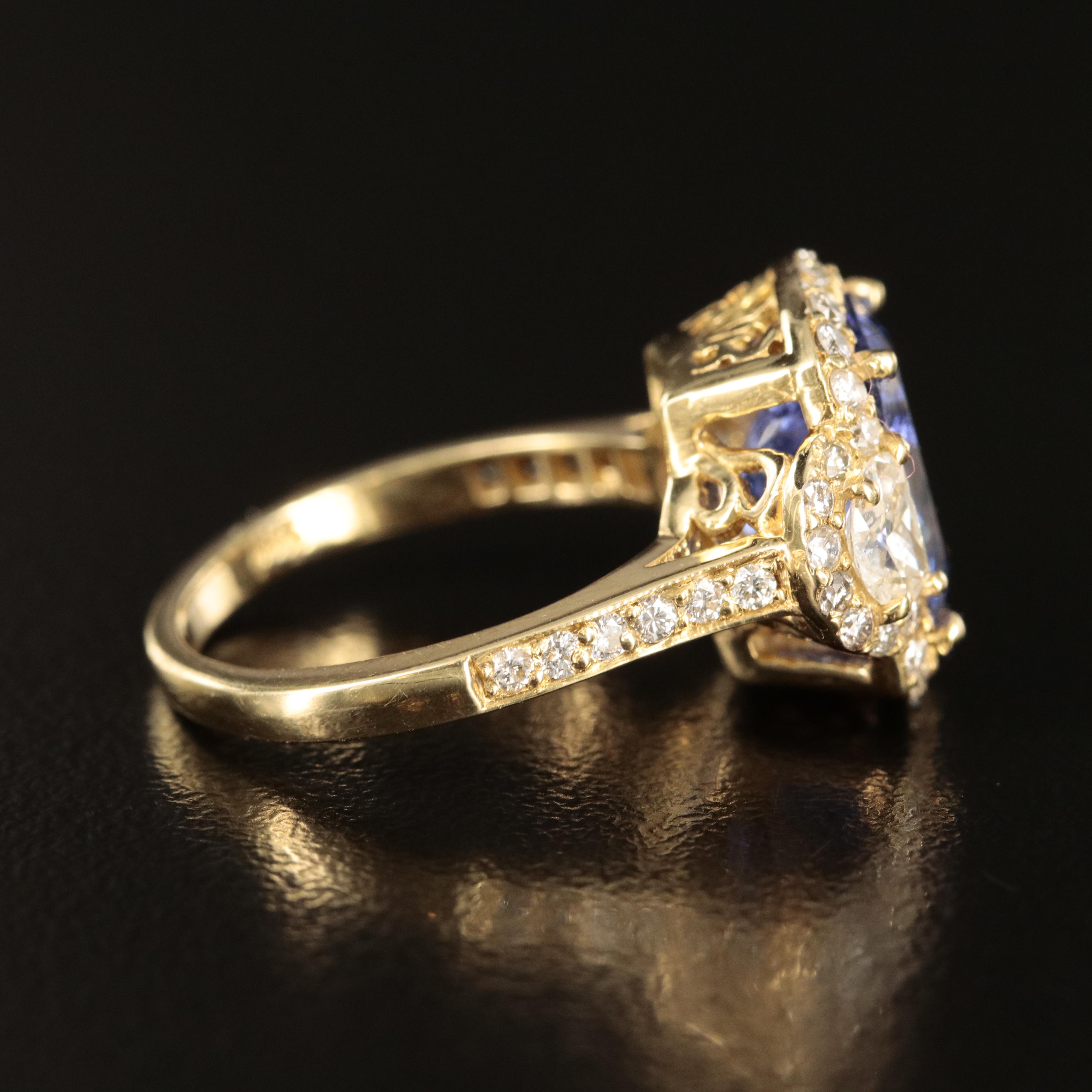 18K 4.20 CT Tanzanite and 1.26 CTW Diamond Ring