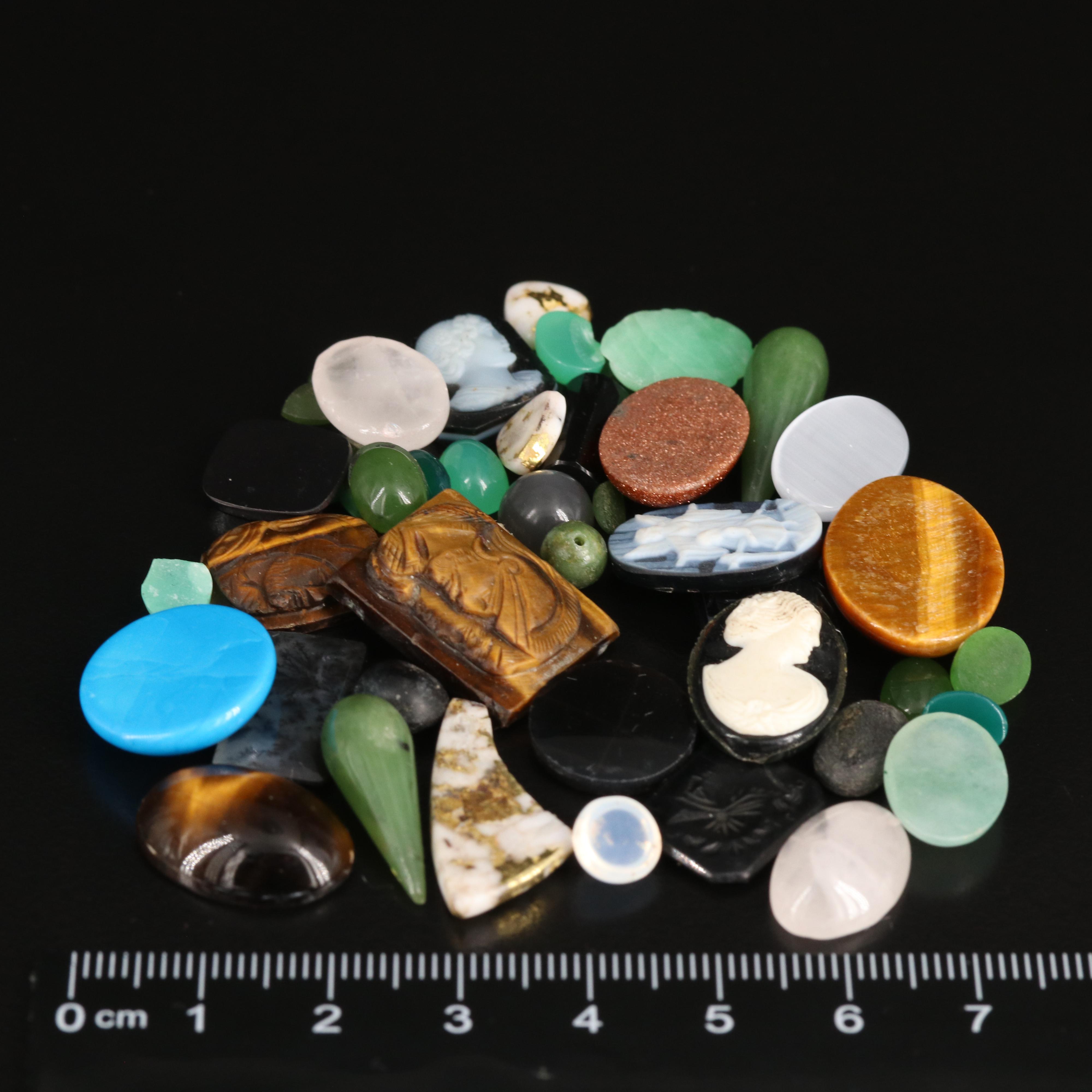 Loose Gemstones Including Dendritic Agate, Jadeite and Tiger's Eye