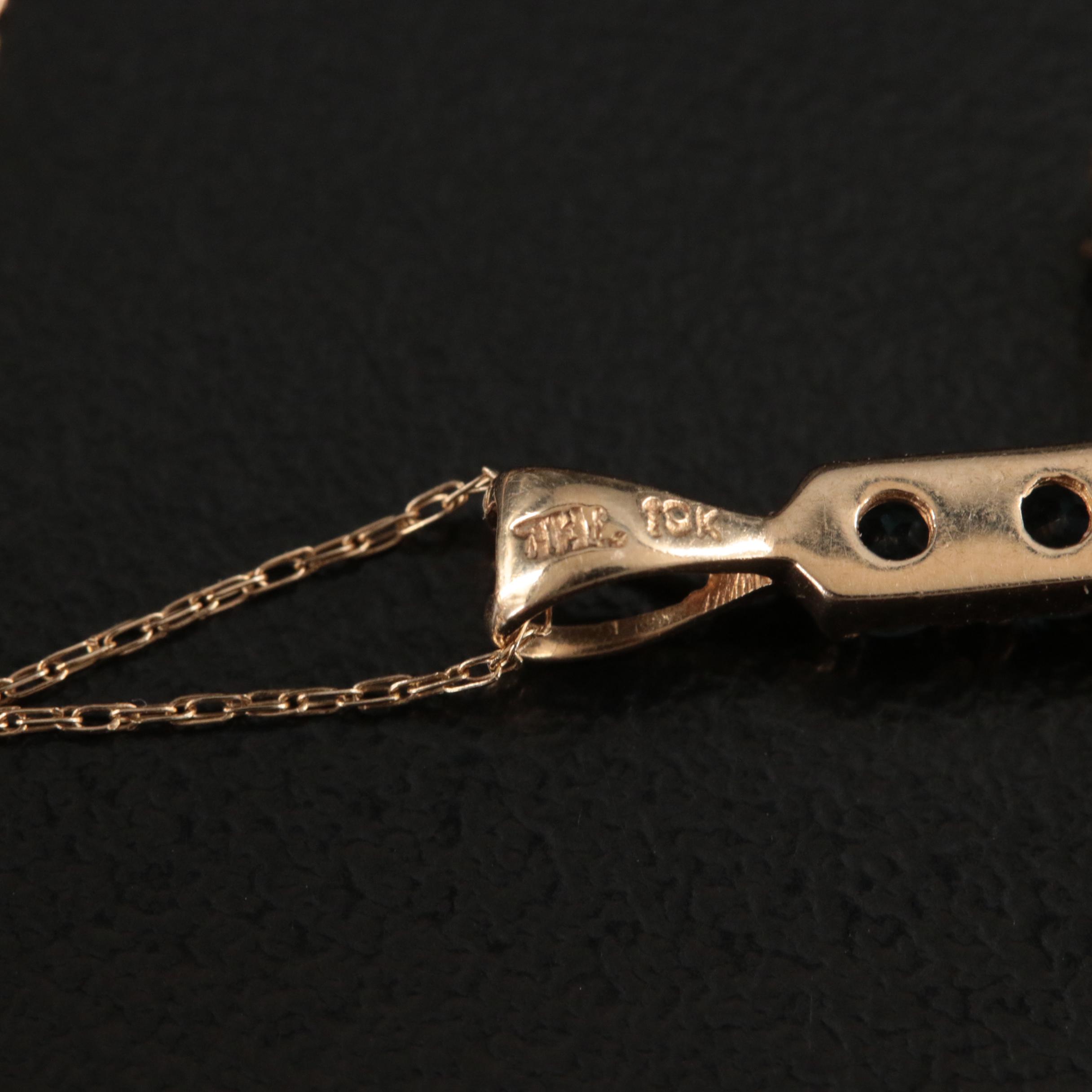 10K Swiss Blue Topaz Cross Necklace