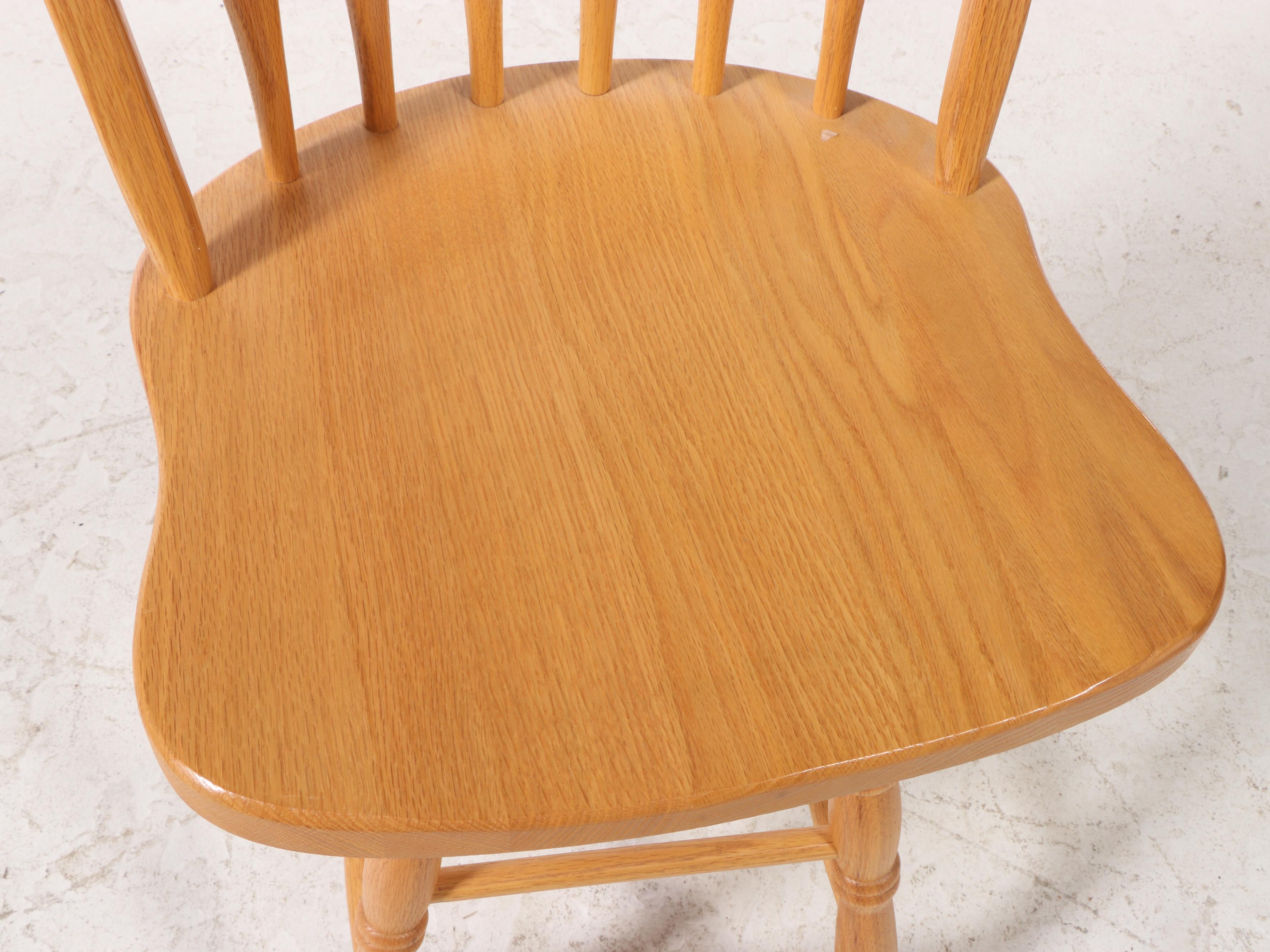 Four American Colonial Style Oak Swivel Windsor Counter Stools