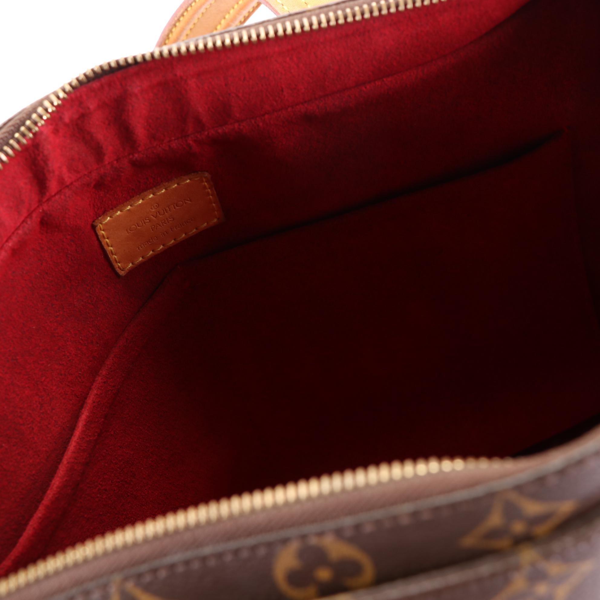 Louis Vuitton Multipli-Cité Bag in Monogram Canvas and Vachetta Leather