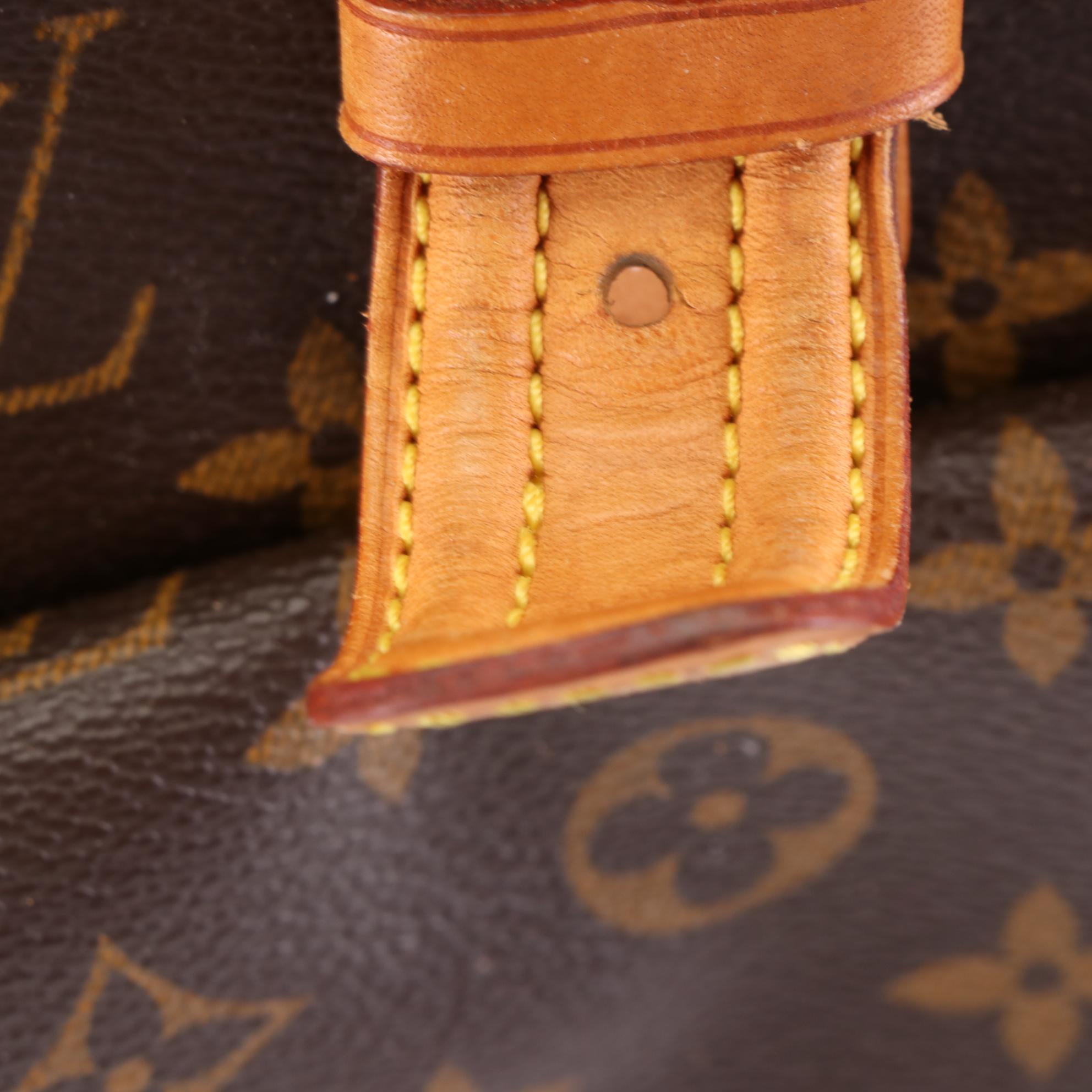 Louis Vuitton Multipli-Cité Bag in Monogram Canvas and Vachetta Leather