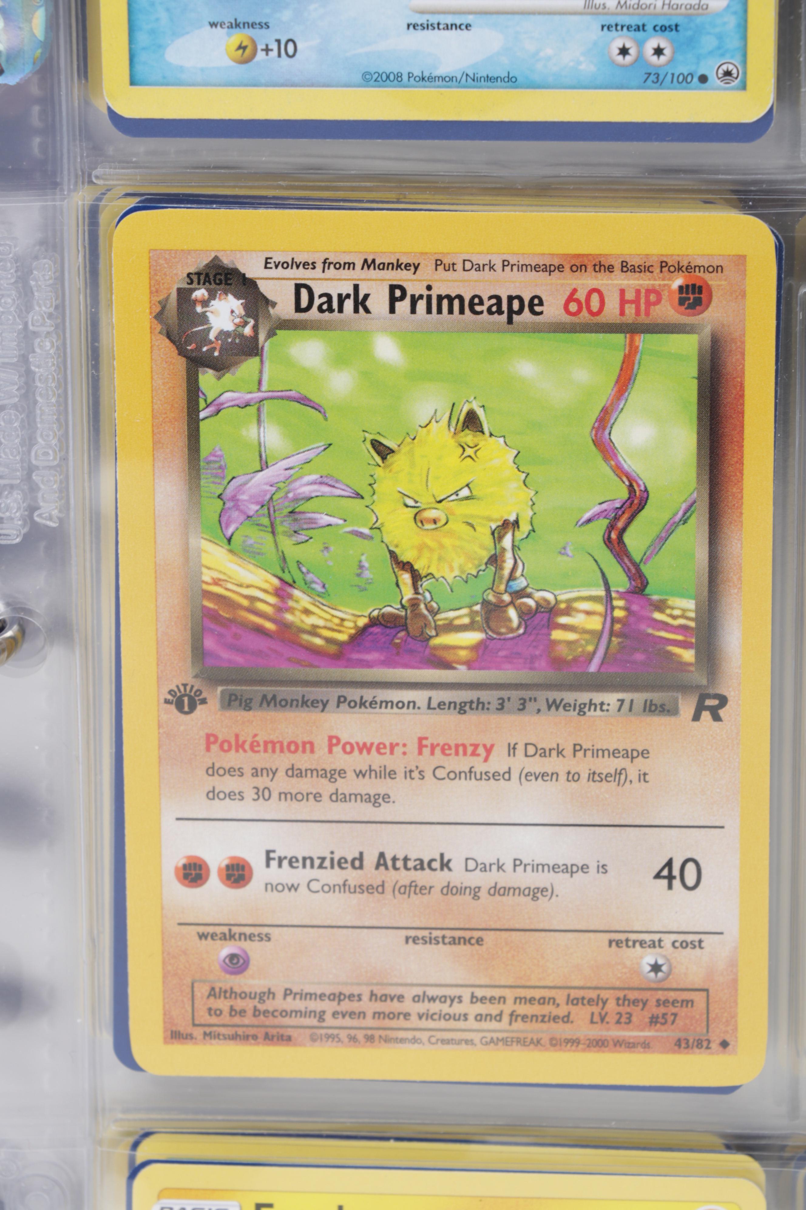 Pokémon Trading Cards Including First Edition Blaine's Tauros and Dark Primeape