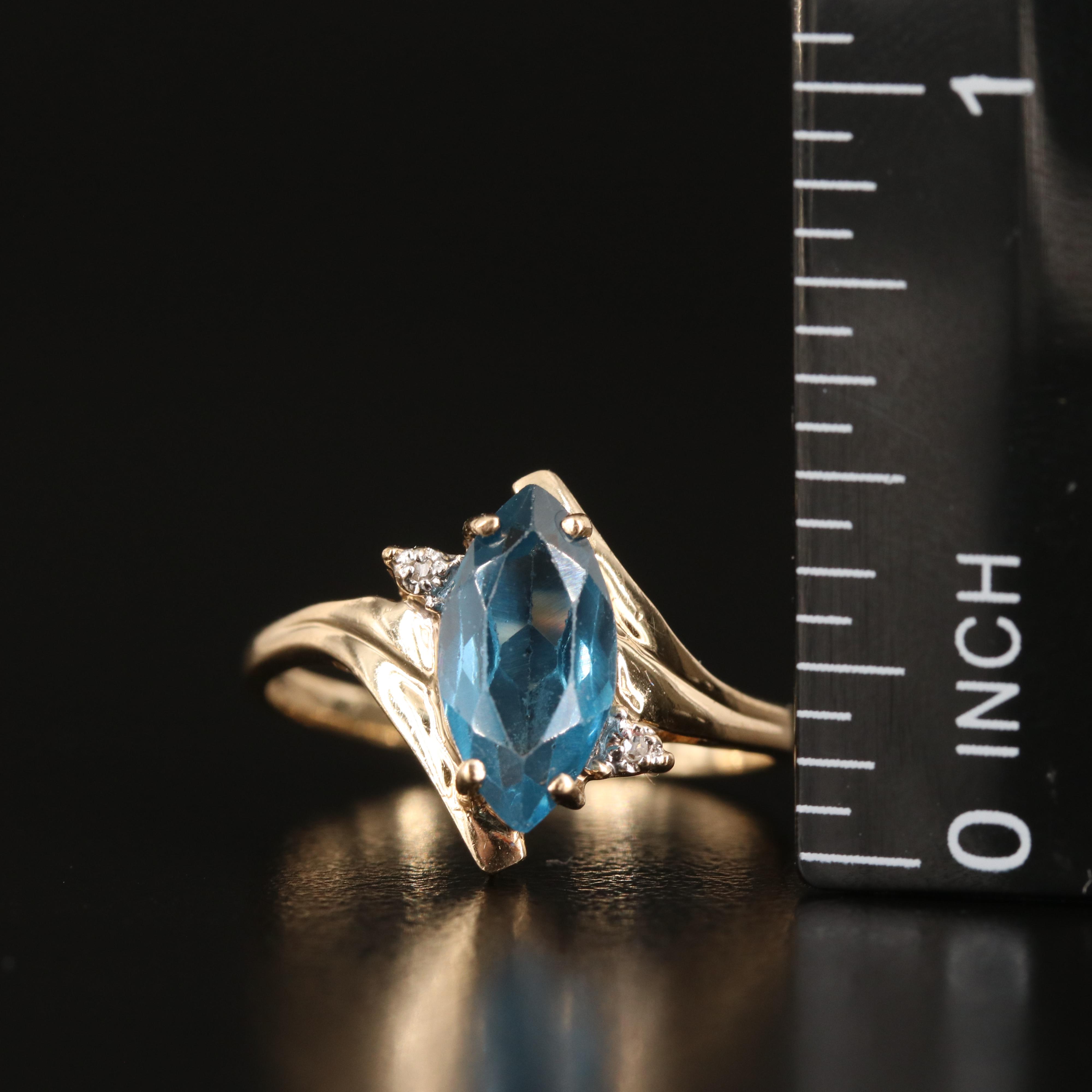 10K London Blue  Topaz and Diamond Navette and Quatrefoil Ring