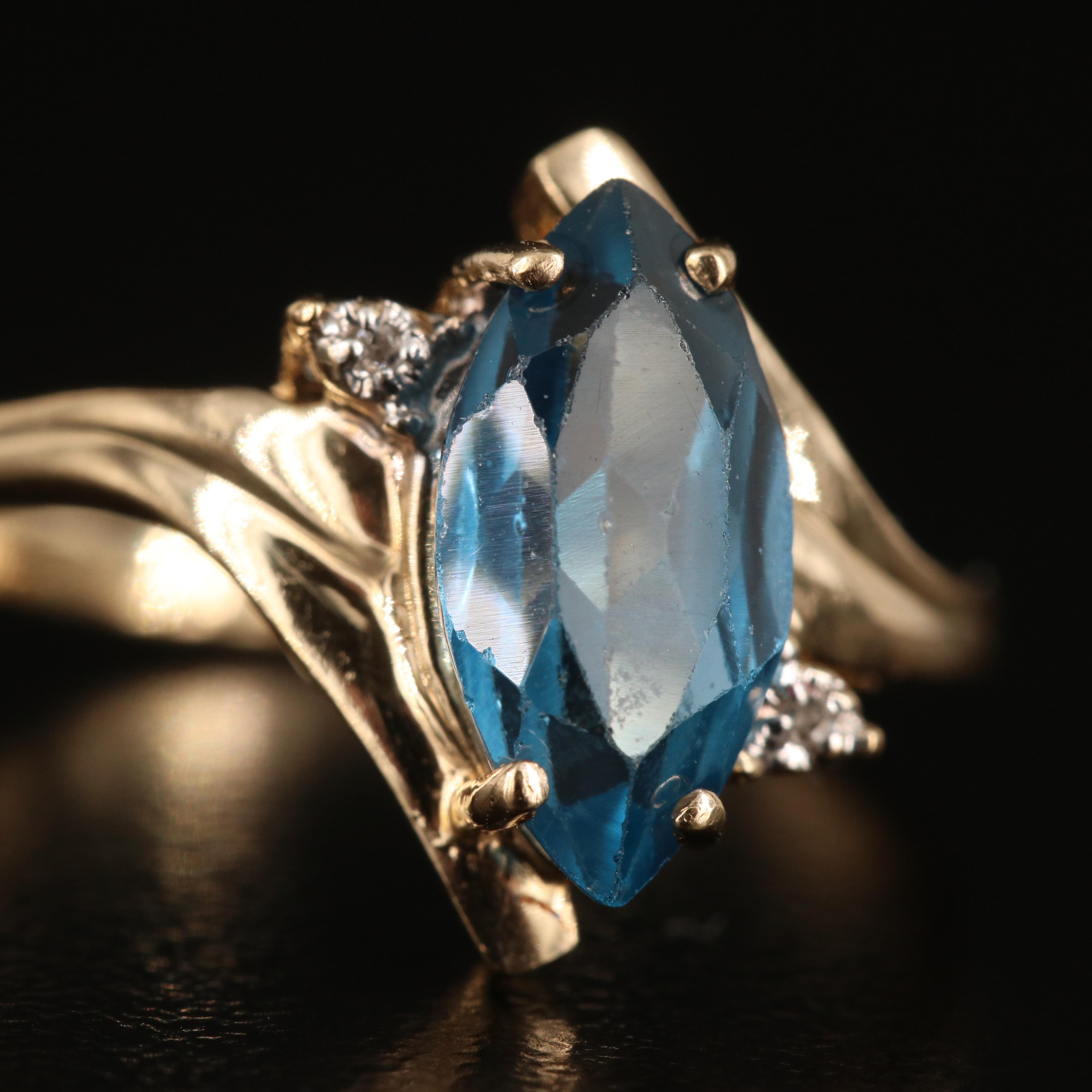 10K London Blue  Topaz and Diamond Navette and Quatrefoil Ring