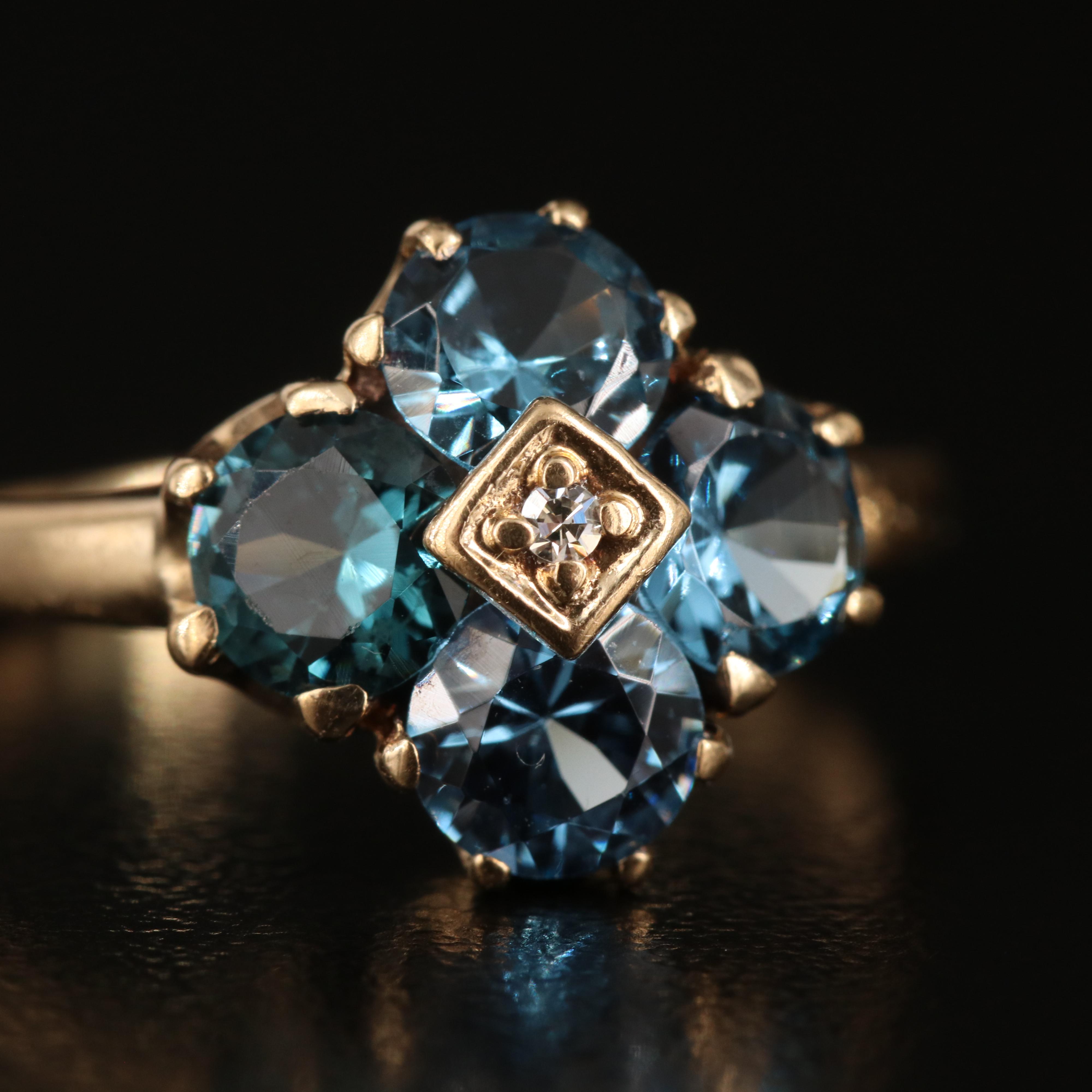 10K London Blue  Topaz and Diamond Navette and Quatrefoil Ring
