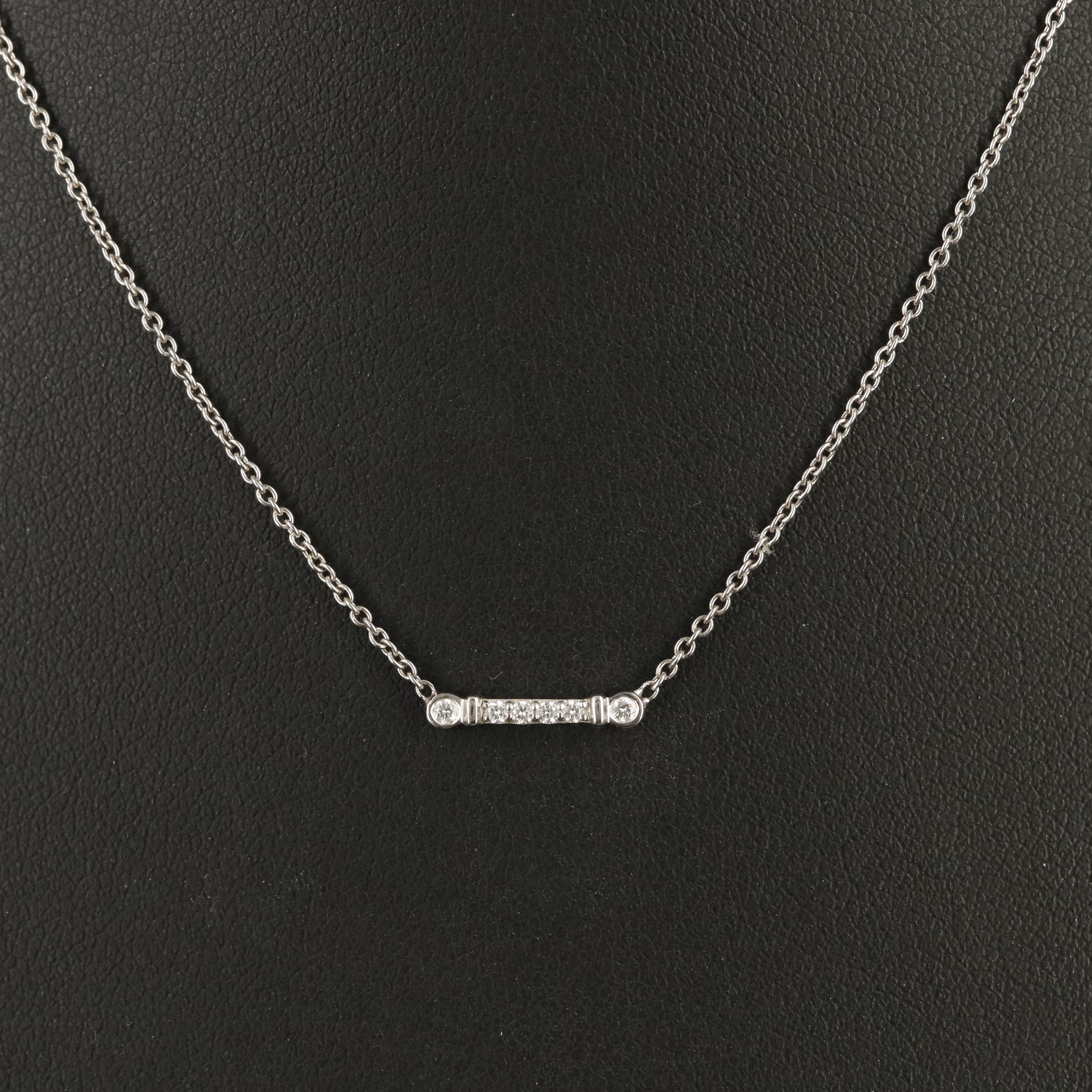 Tiffany & Co "Fleur de Lis" Platinum and 0.07 CTW Diamond Key Bar Necklace