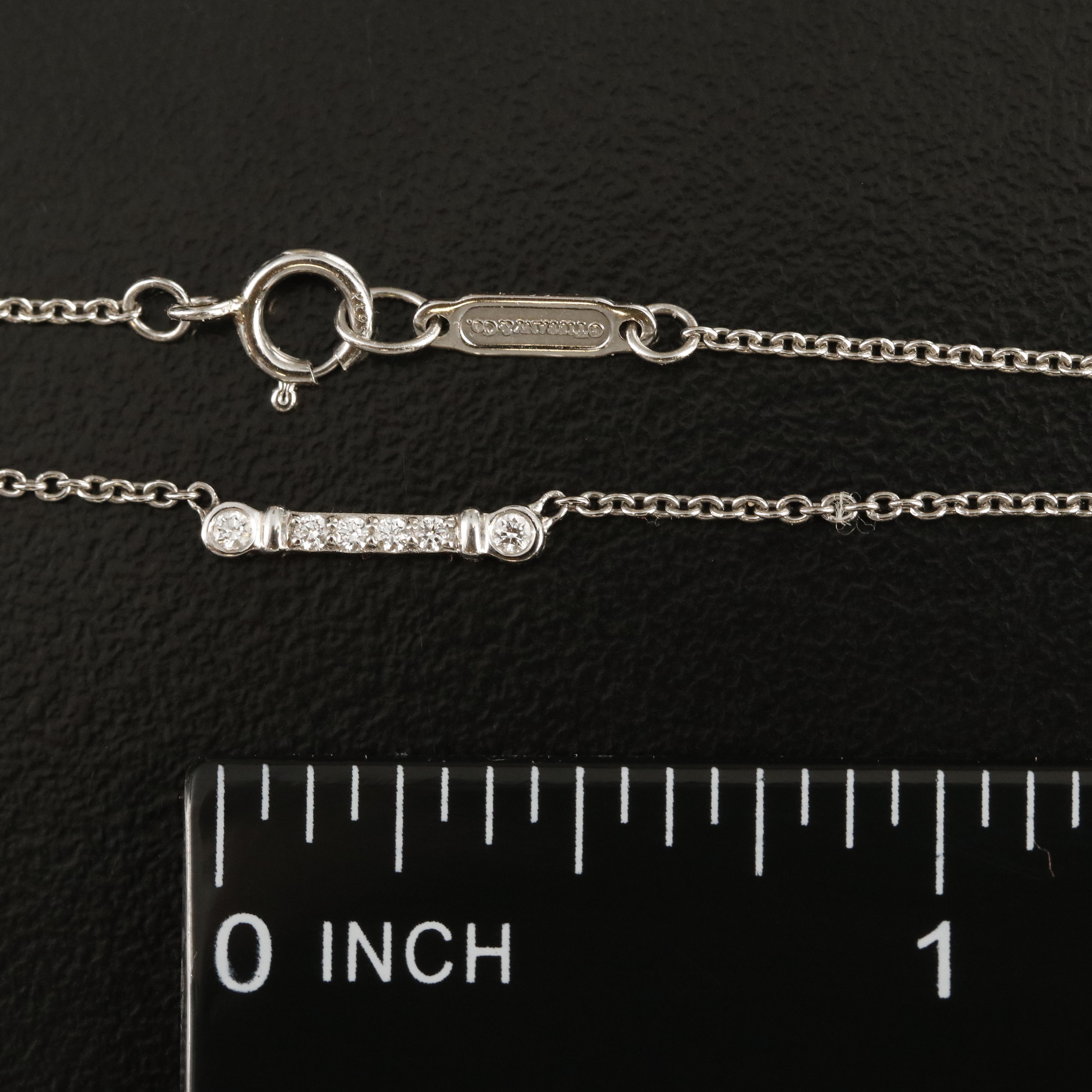 Tiffany & Co "Fleur de Lis" Platinum and 0.07 CTW Diamond Key Bar Necklace