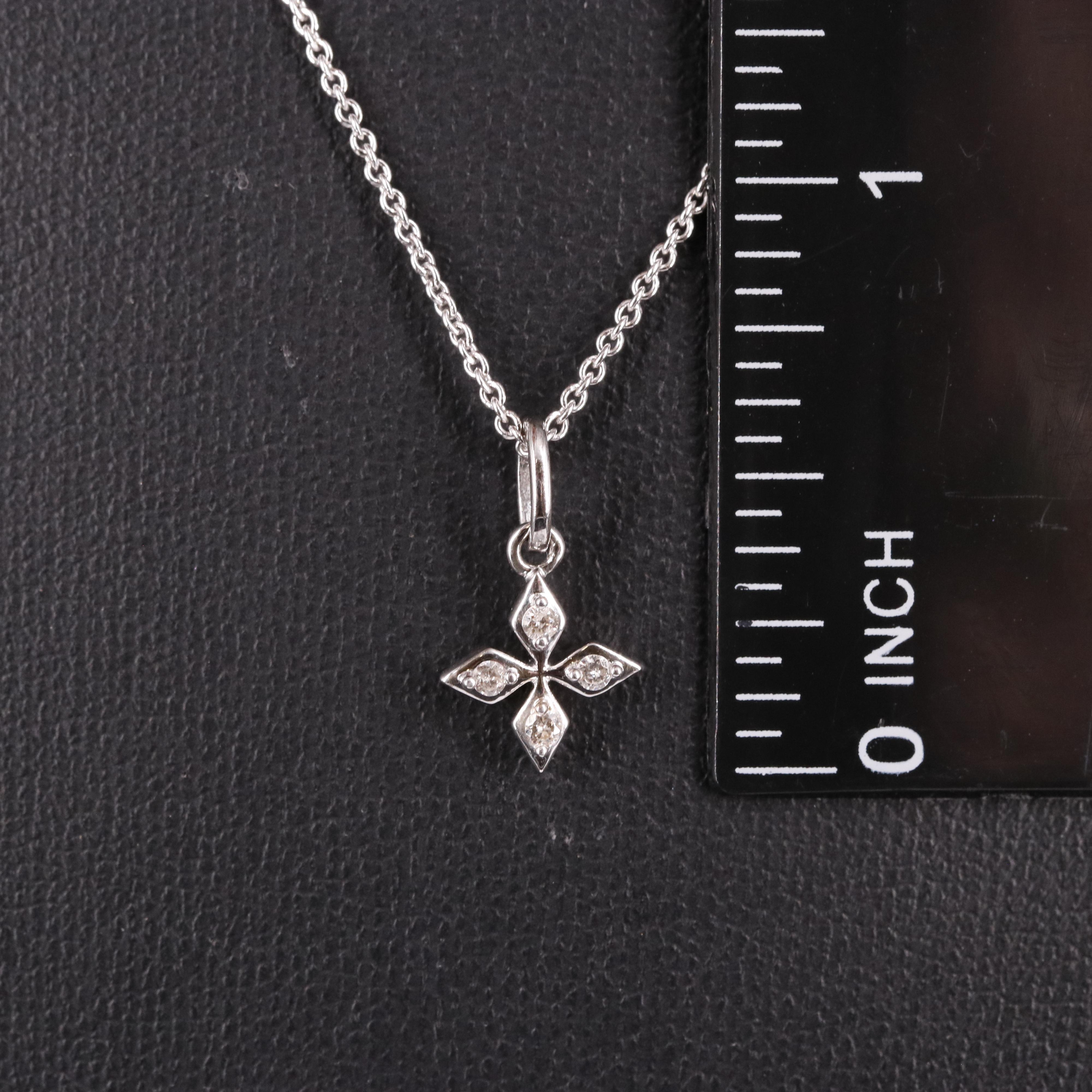 Sterling 0.05 CTW Diamond Four Pointed Star Pendant Necklace