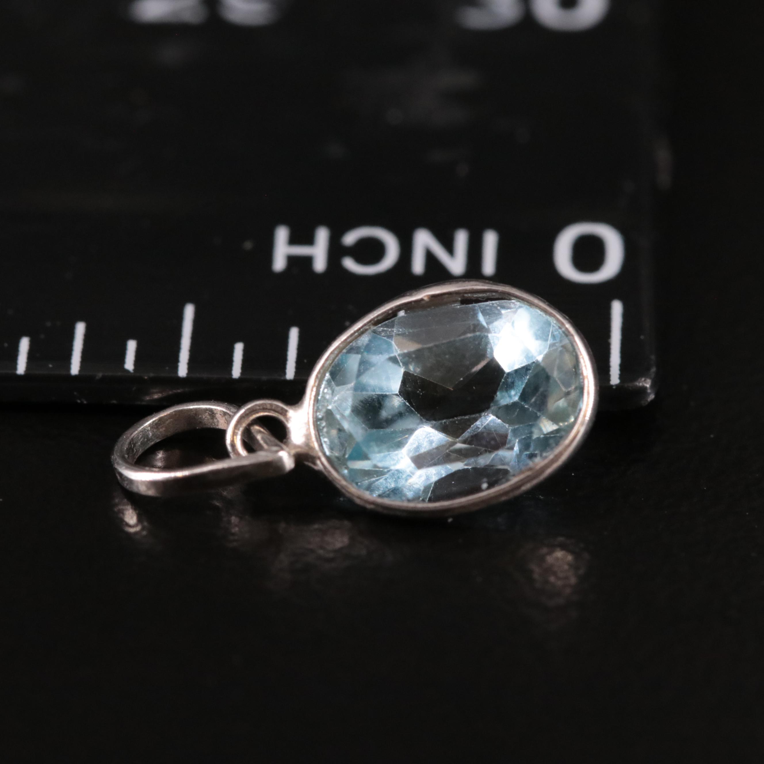 14K Blue Topaz Pendant