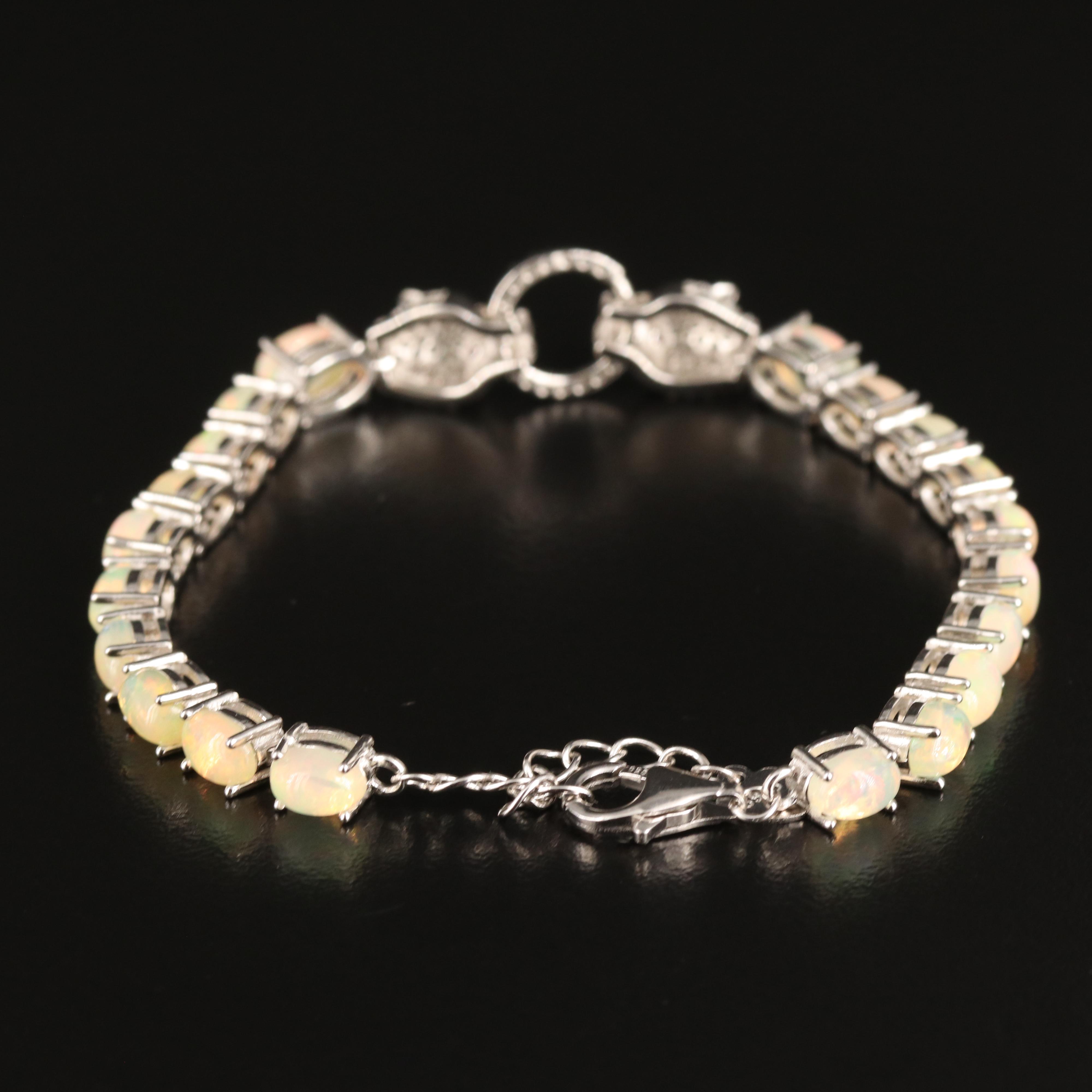 Sterling Opal, Cubic Zirconia and Ruby Feline Door Knocker Bracelet