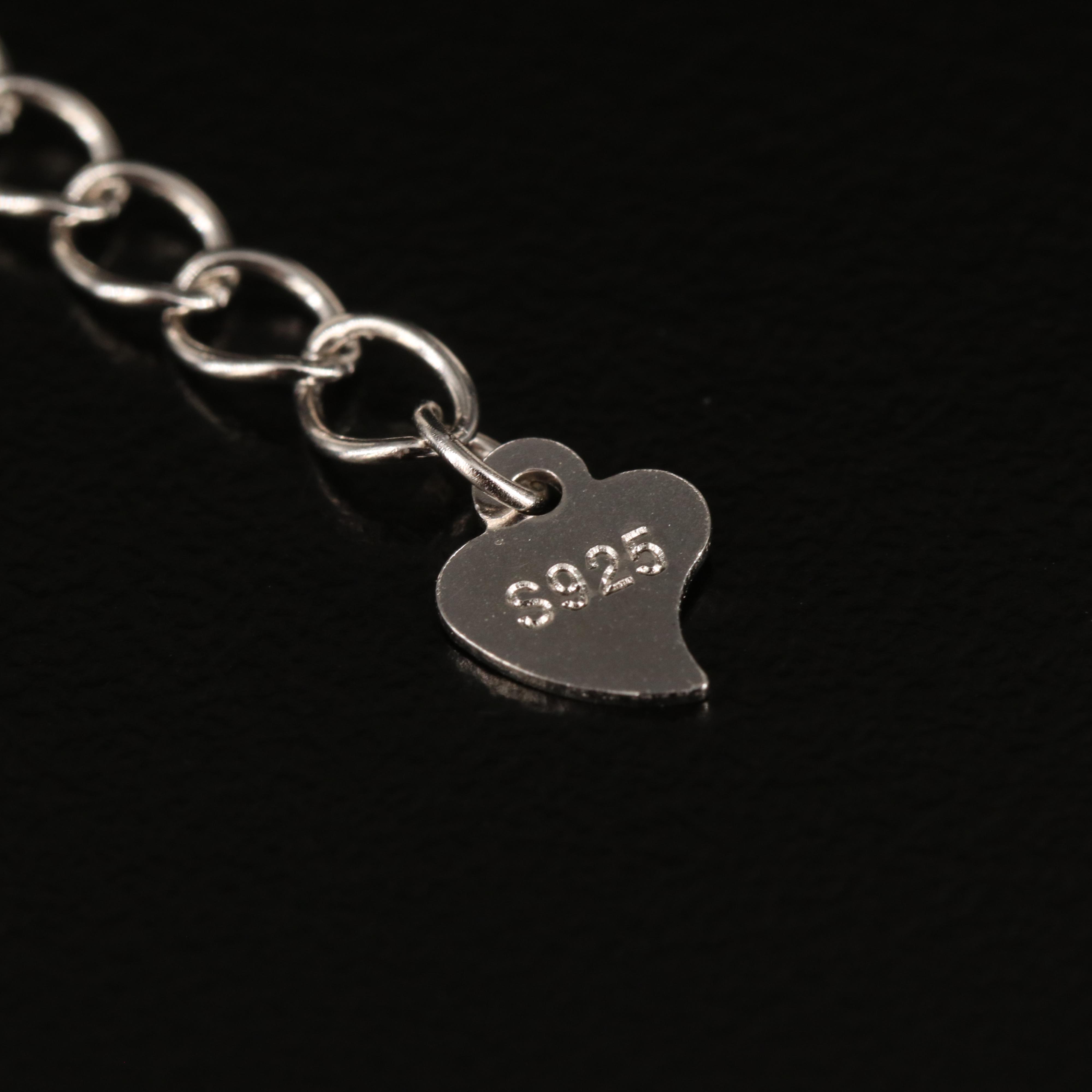 Sterling Opal, Cubic Zirconia and Ruby Feline Door Knocker Bracelet