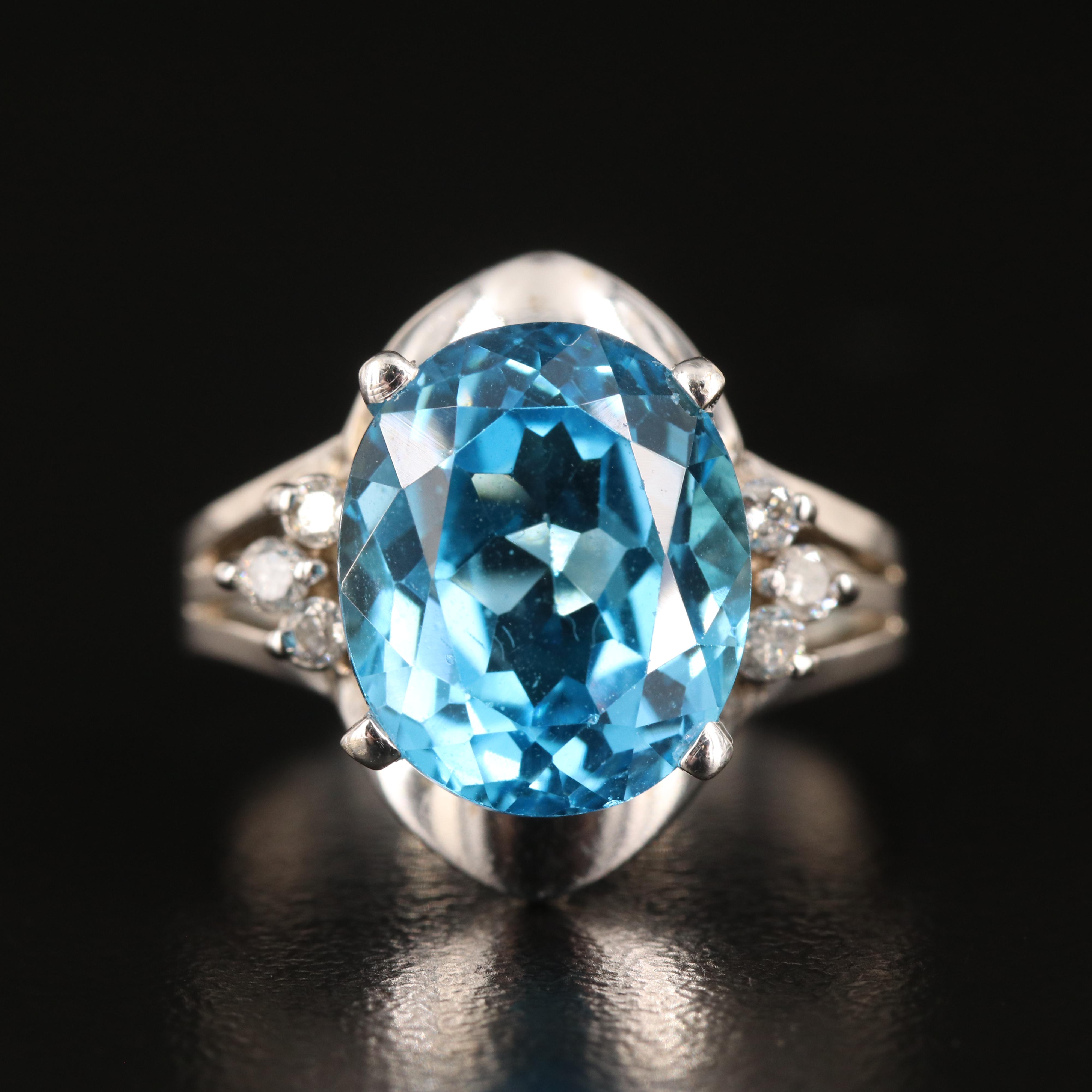 14K Swiss Blue Topaz and Diamond Ring