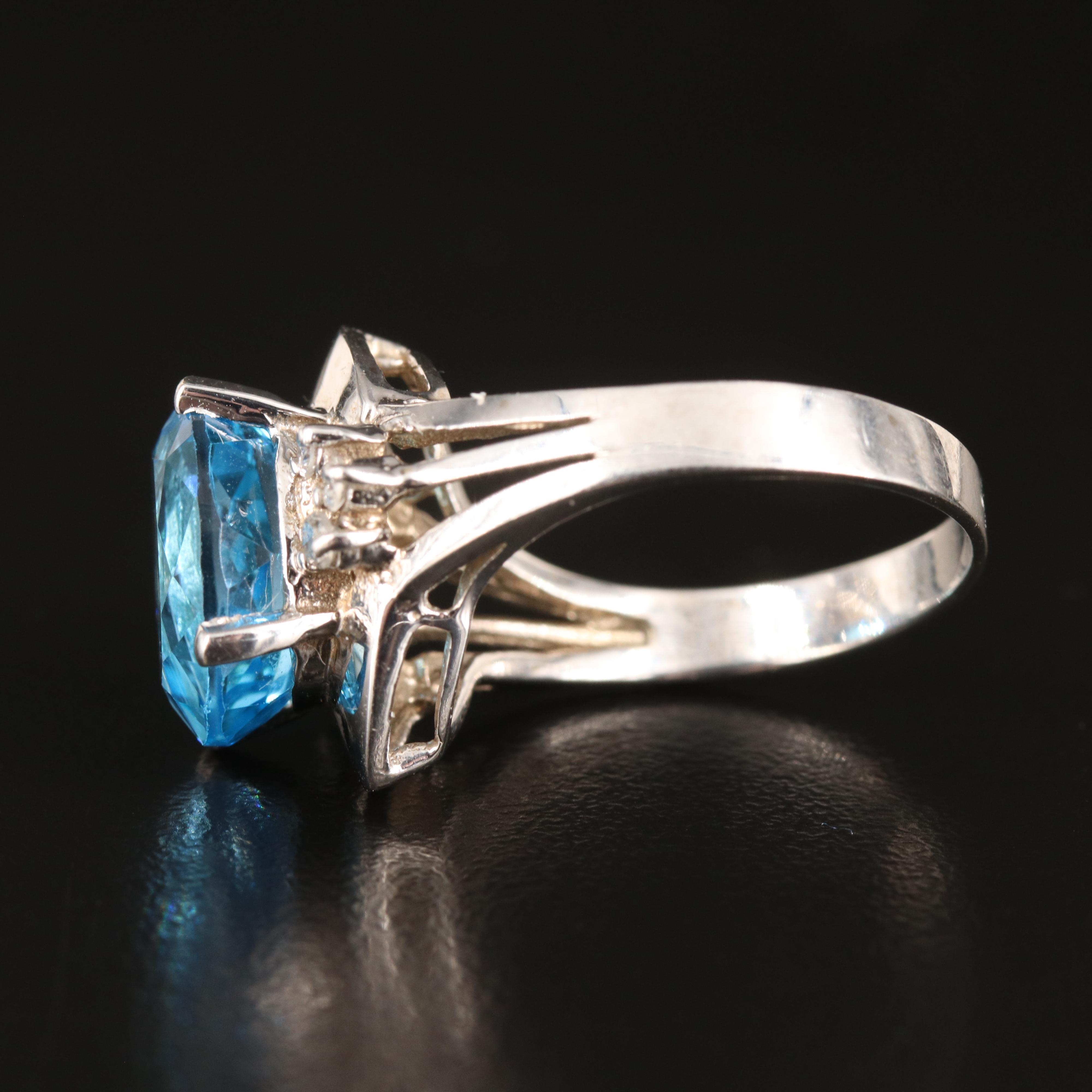 14K Swiss Blue Topaz and Diamond Ring