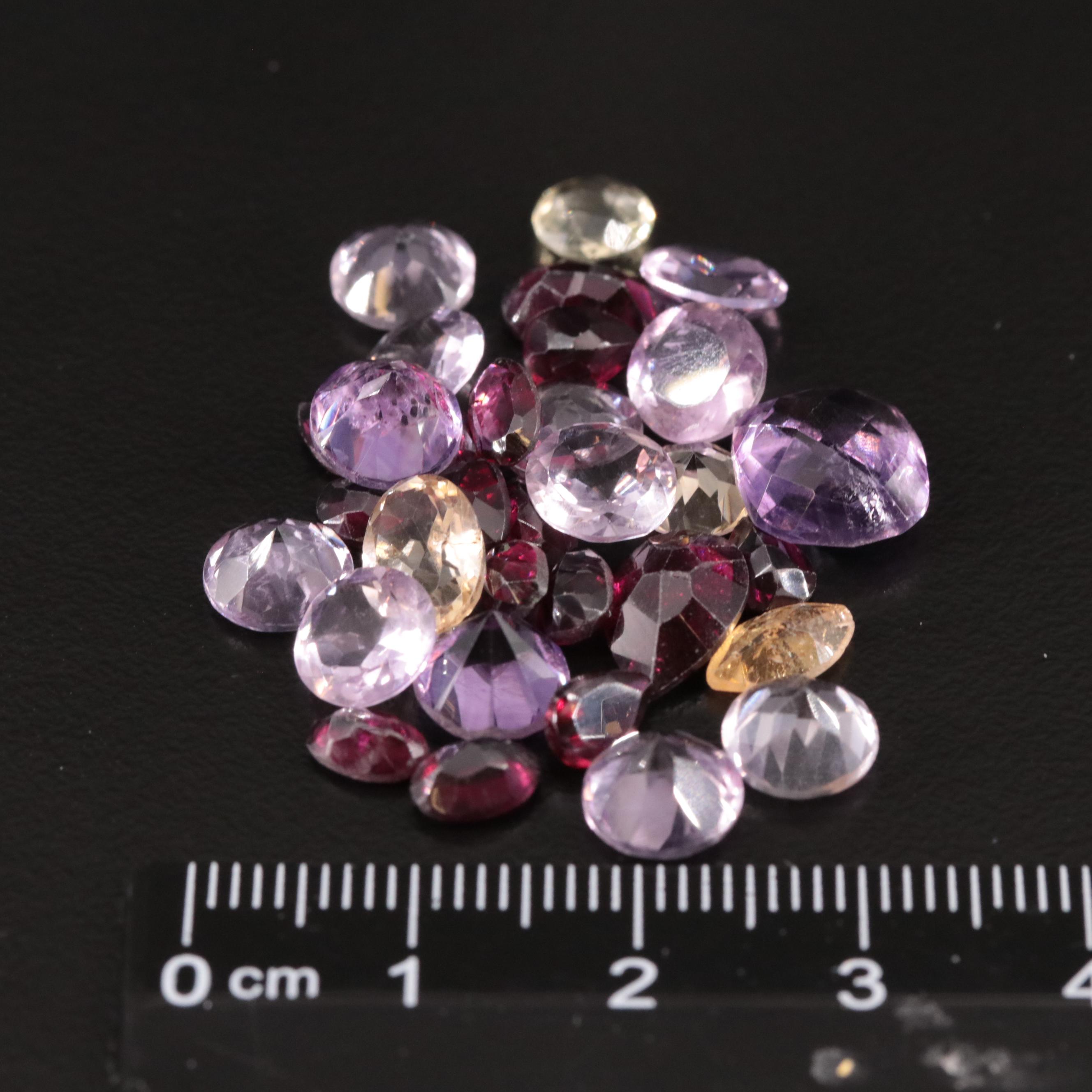 Loose 32.05 CTW Amethyst, Citrine, and Garnet