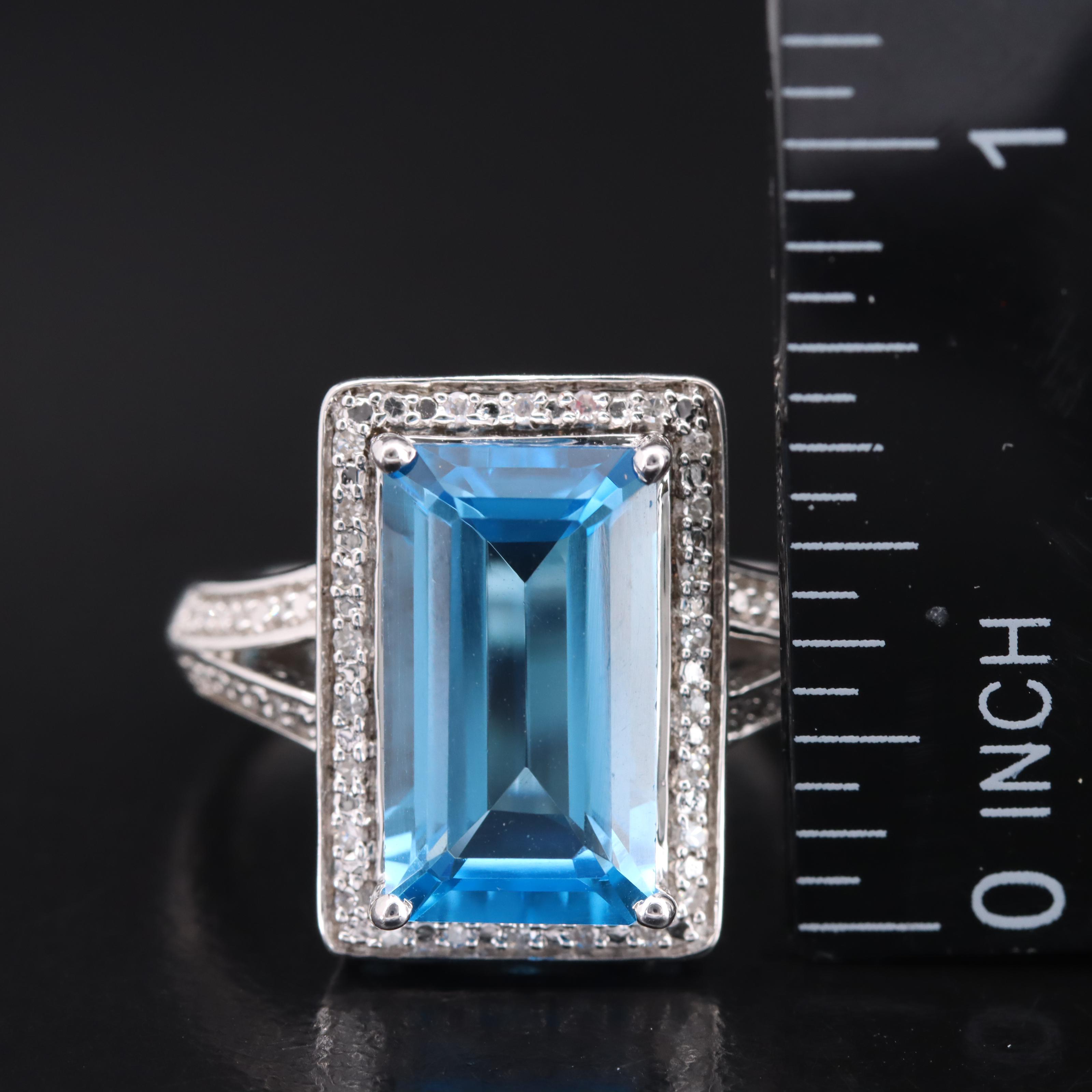 Sterling Swiss Blue Topaz and Diamond Halo Ring