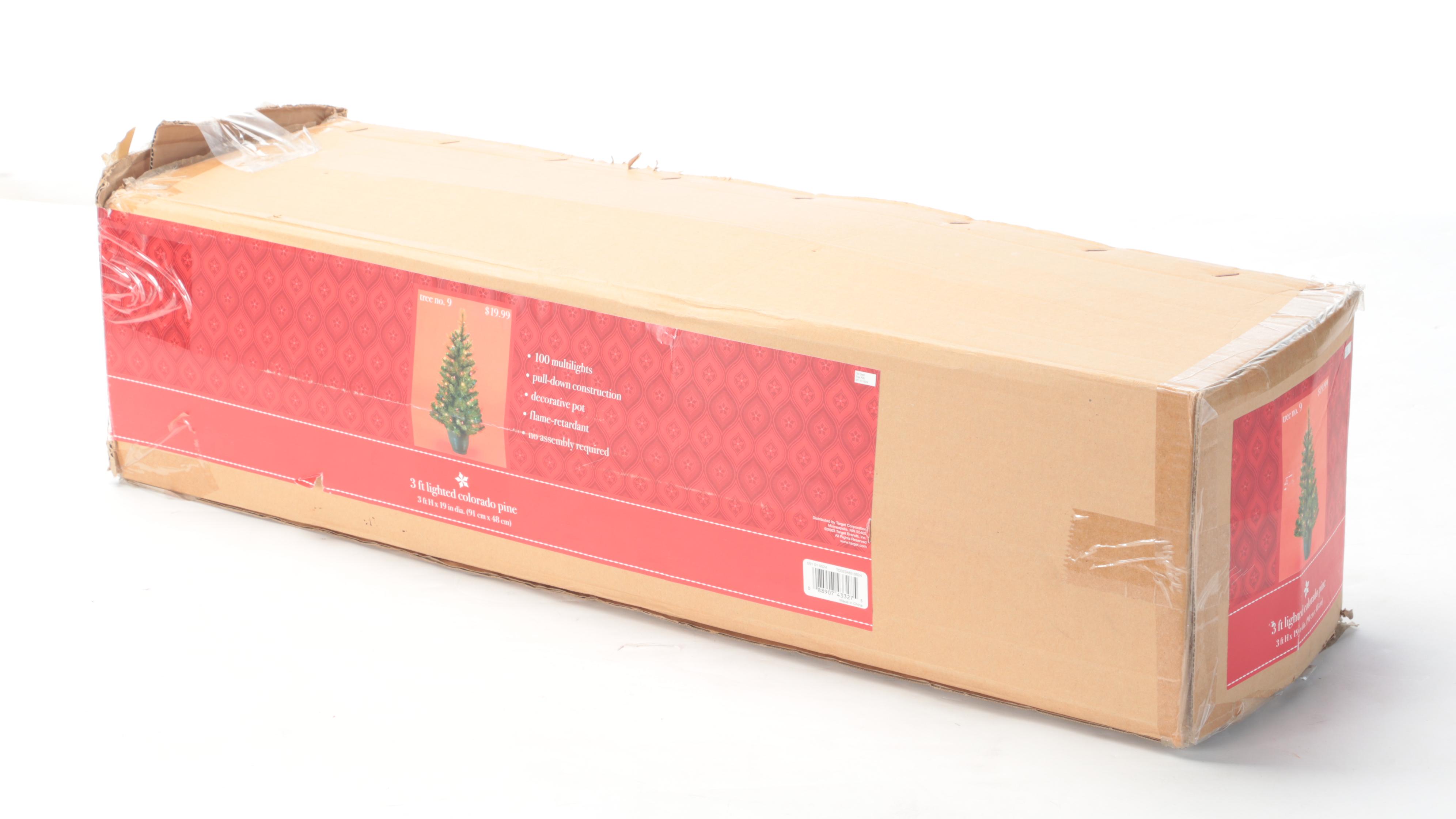 Pre-Lit Christmas Trees with Berry Garlands