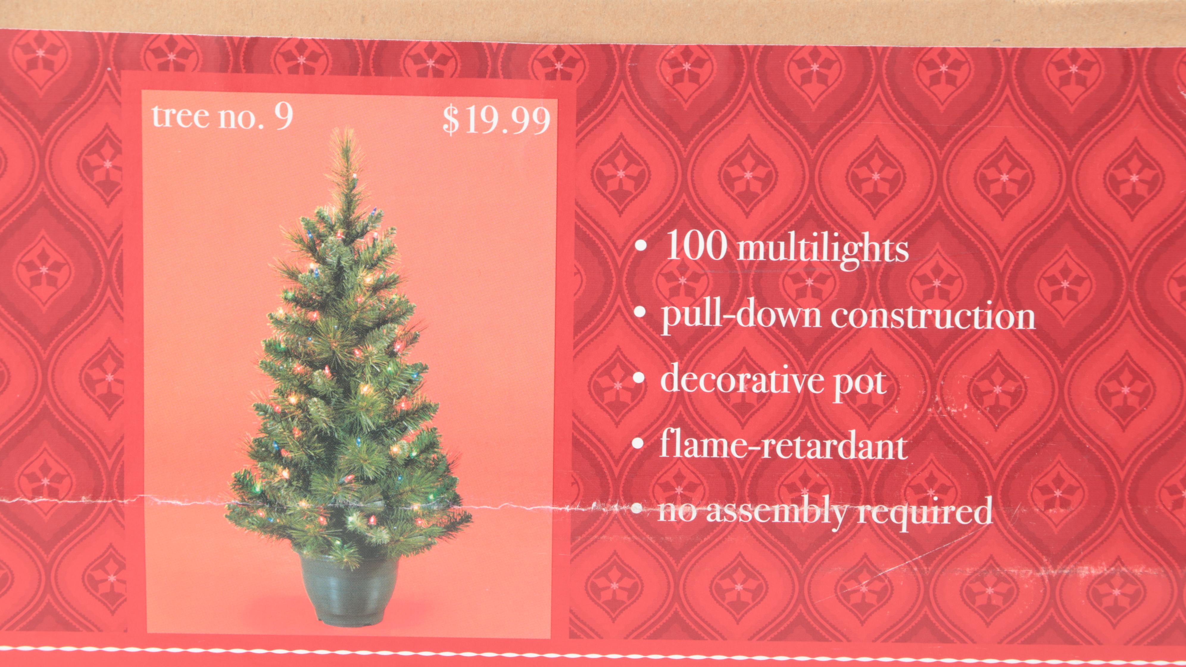 Pre-Lit Christmas Trees with Berry Garlands