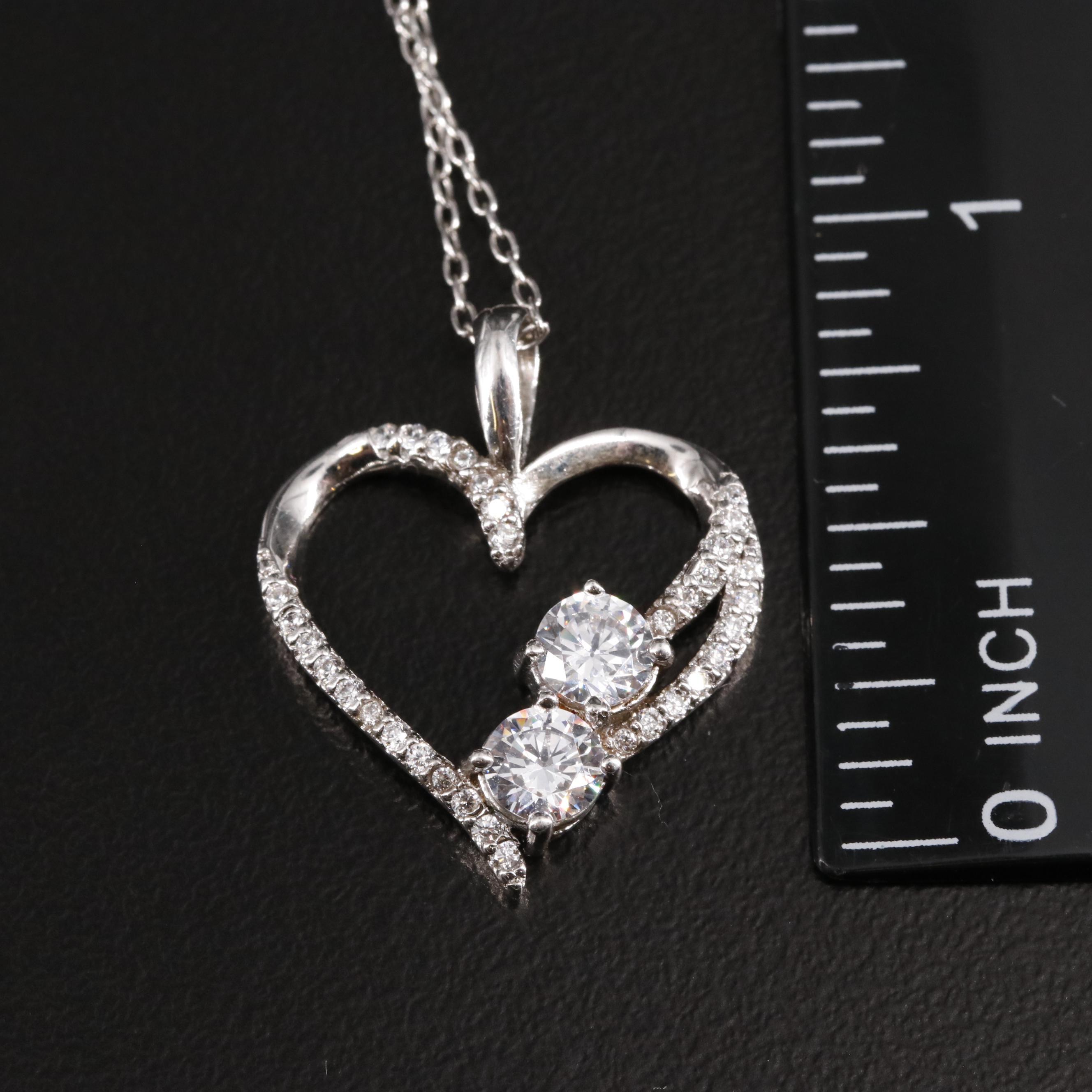 Sterling and Cubic Zirconia Heart and Baby Pendant Necklaces