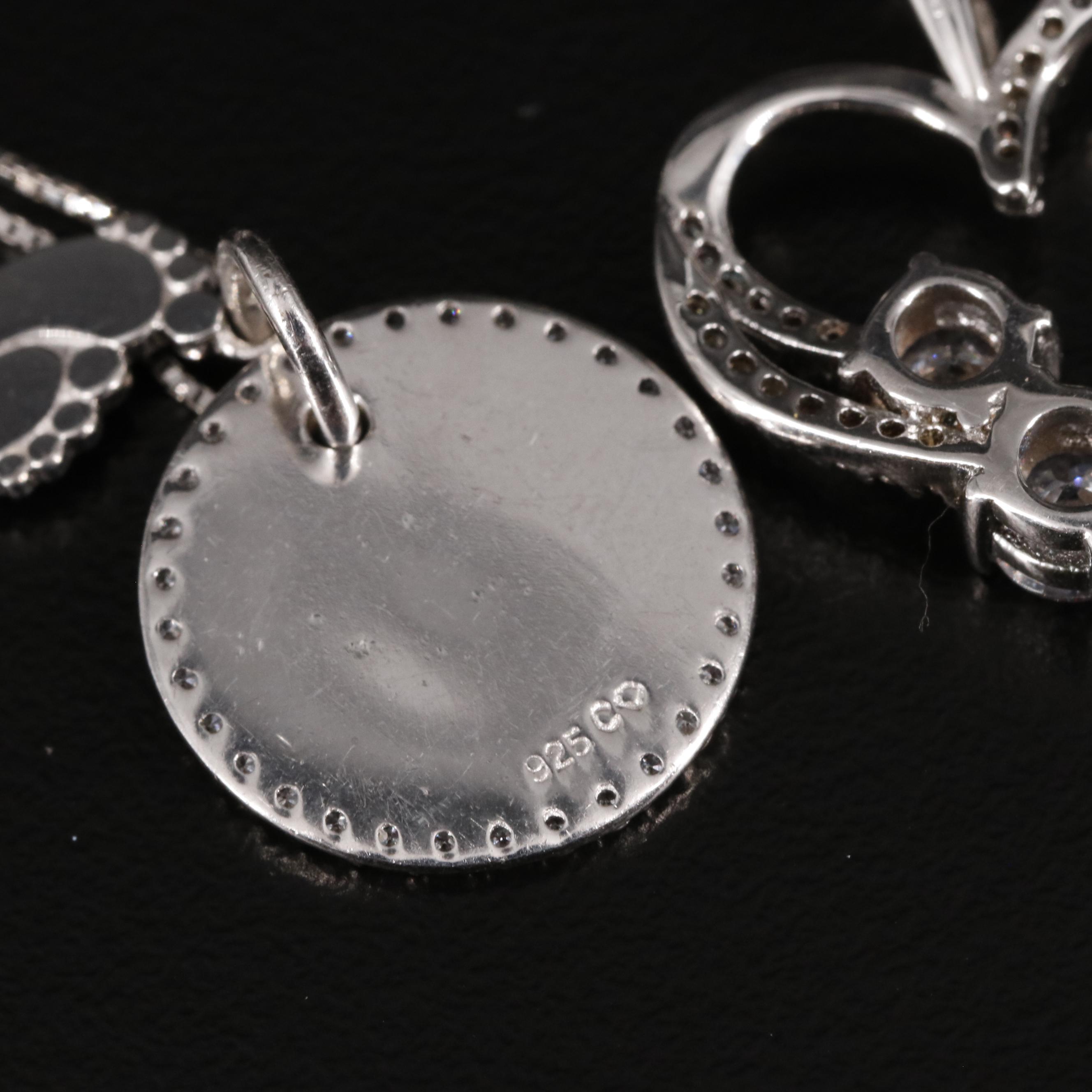 Sterling and Cubic Zirconia Heart and Baby Pendant Necklaces