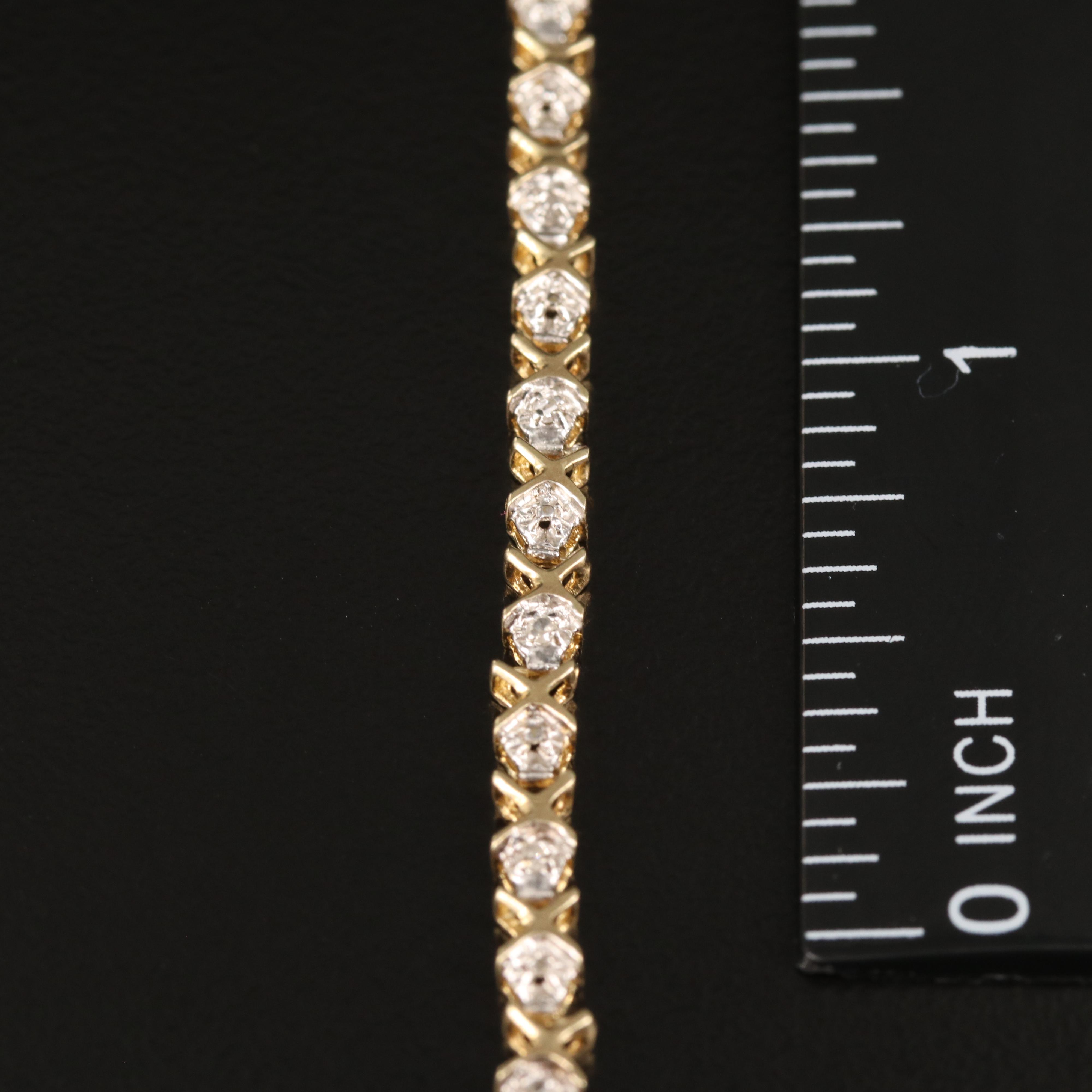 10K 0.08 CTW Diamond "XO" Bracelet
